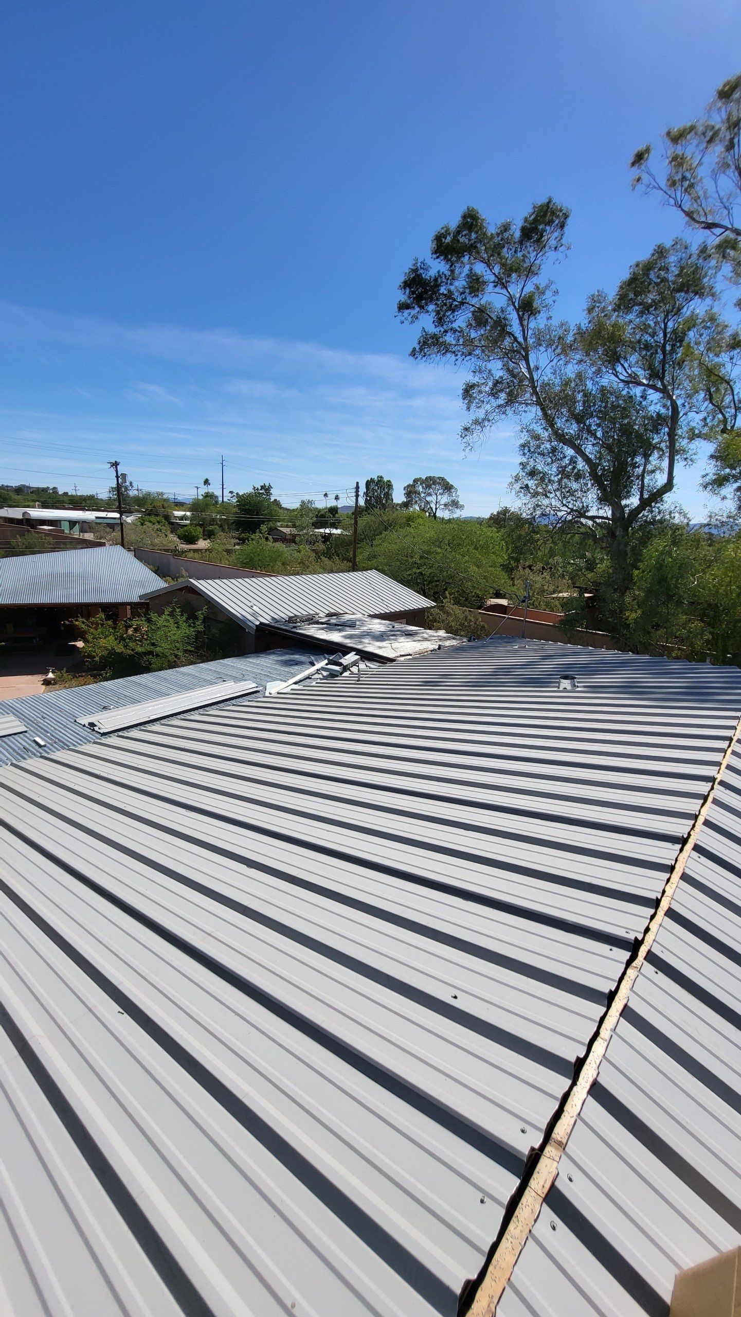 Light Stone Exposed Fastener by Reimagine Roofing
