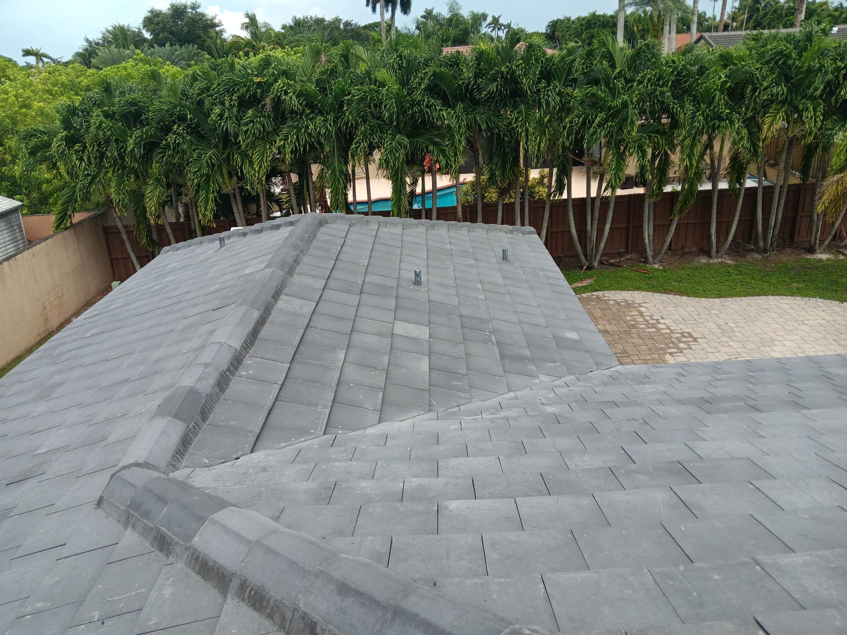 Residential Roofing Installation using Tile Roof by City Roofing Inc