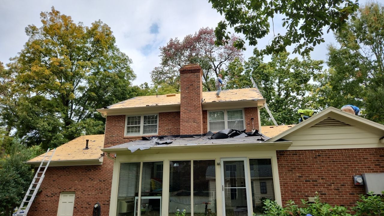 New Roof with Solar Panels by Just In Time Roofing and Restoration
