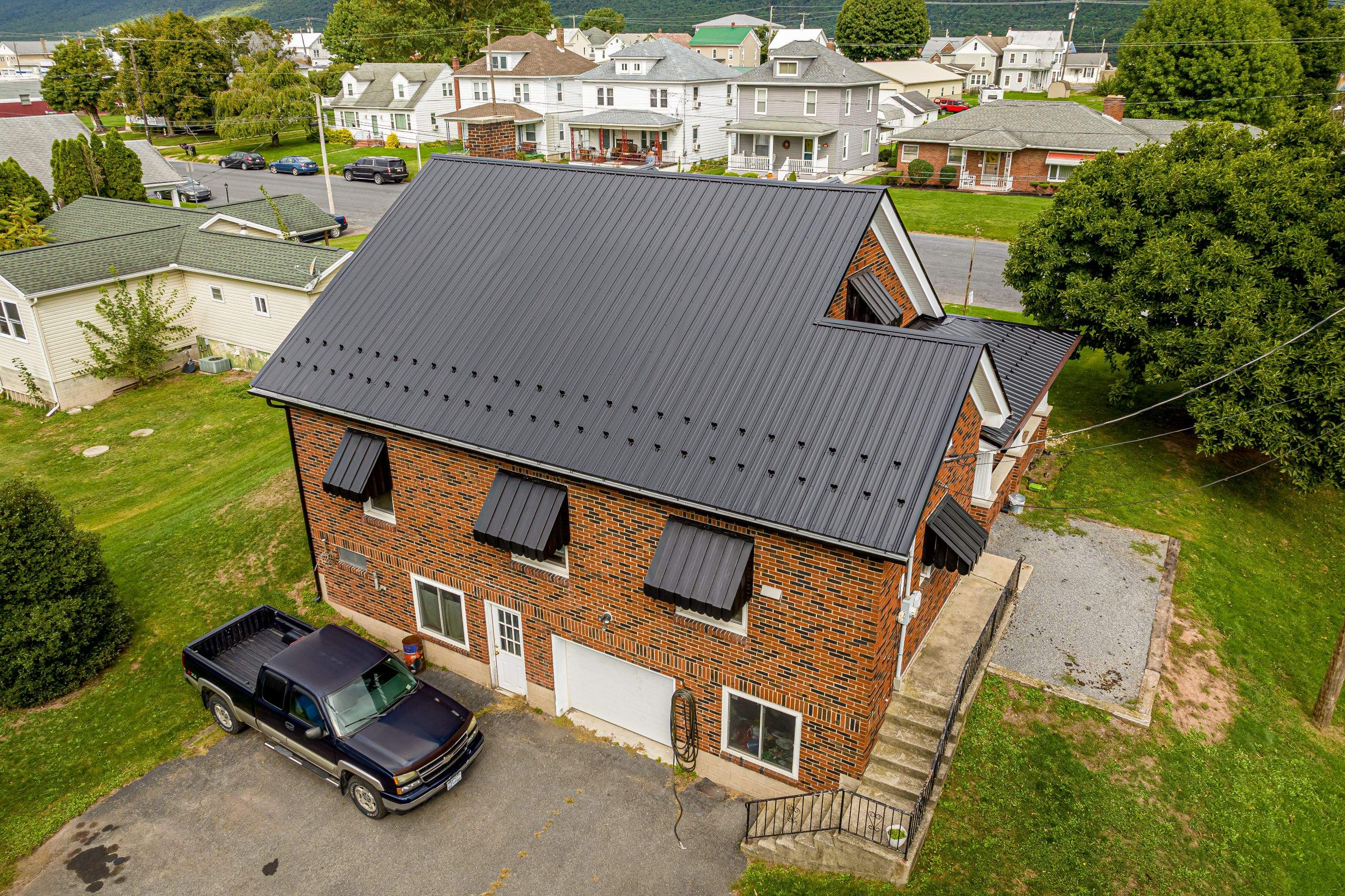 Metal Roof-black by Esh Builders