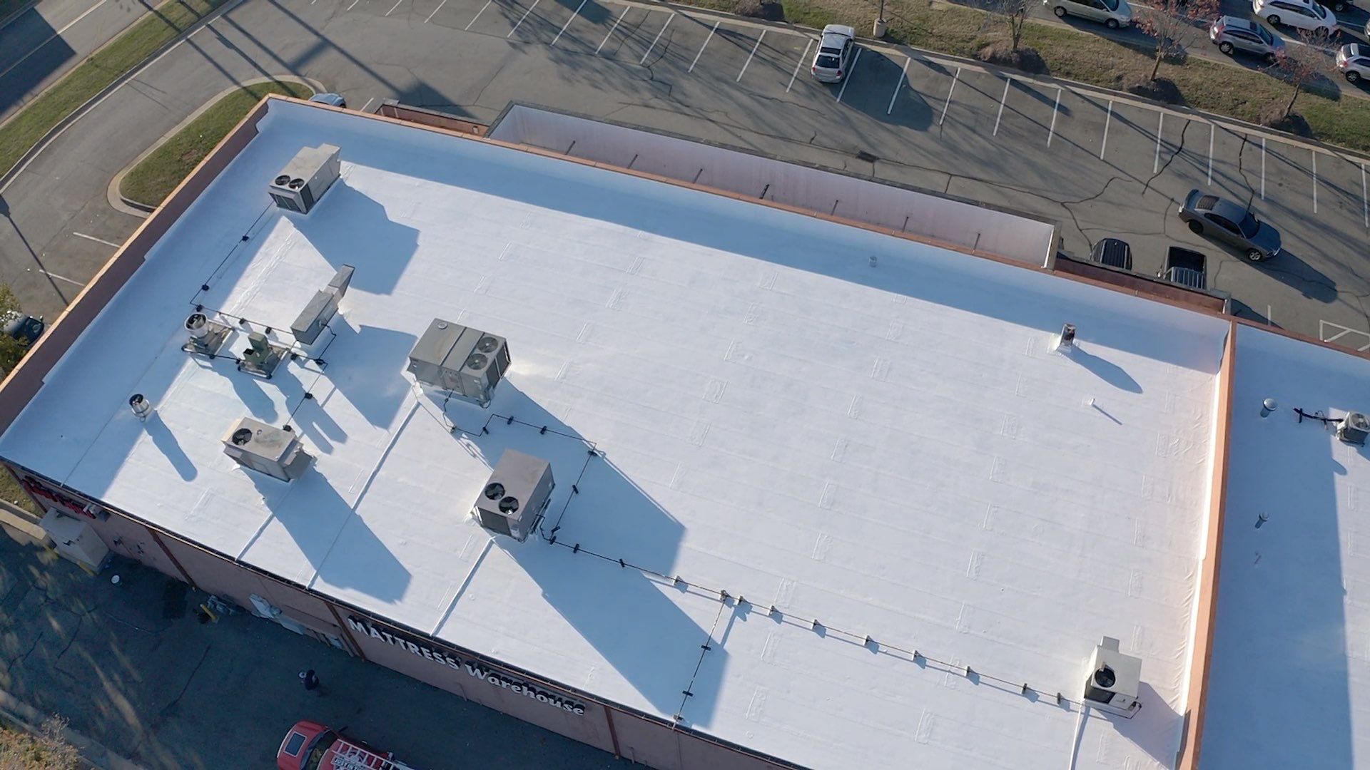 Commercial Coating using Poly Urerthane and Silicone Coating by Just In Time Roofing and Restoration