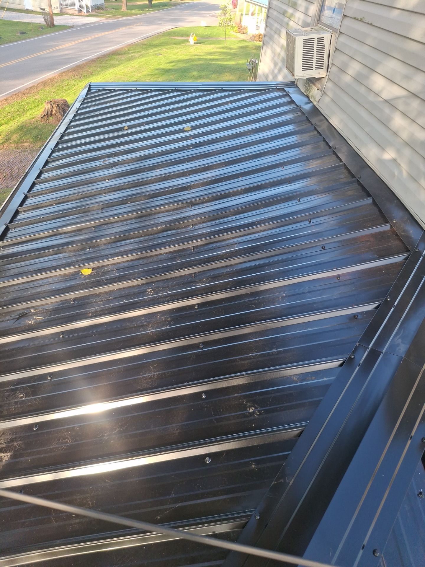 Residential Roofing Installation using Metal by Rainstoppers Roofing