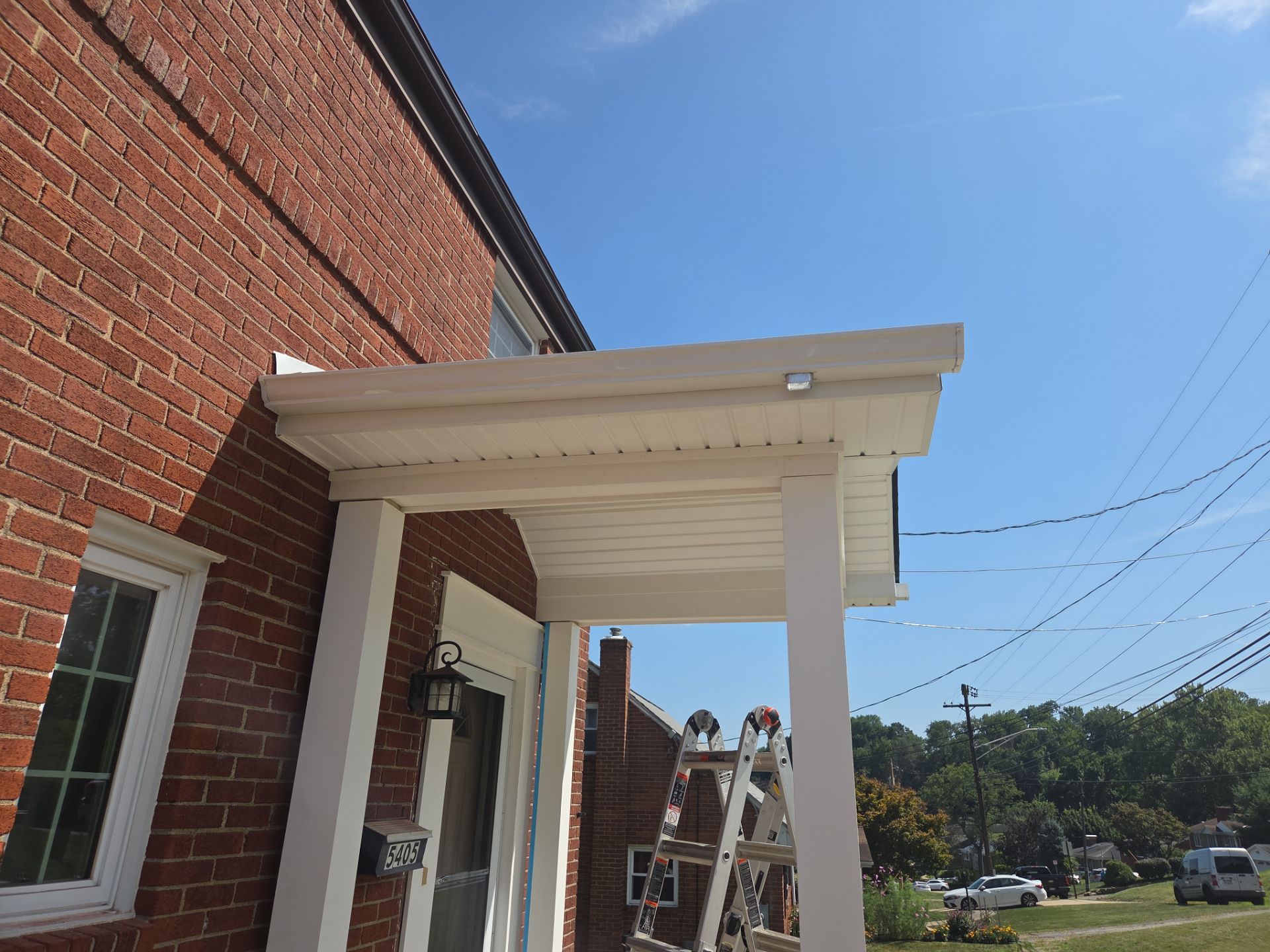 Concret and roof build  by Cousins Roofing Siding & Decks