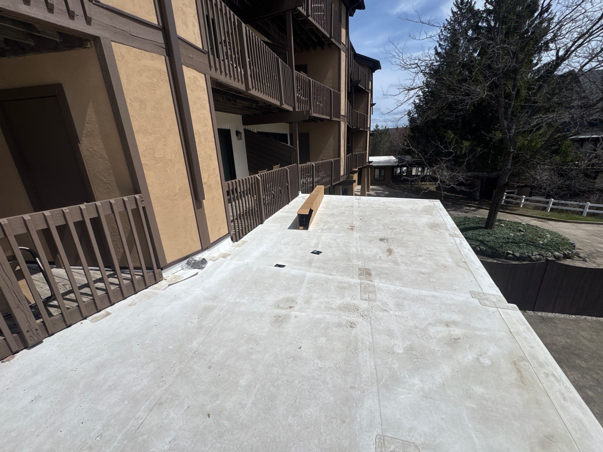 Gutter and Gutter Helmet Installation for Harbor Springs Hotel by Rainbow Seamless Systems