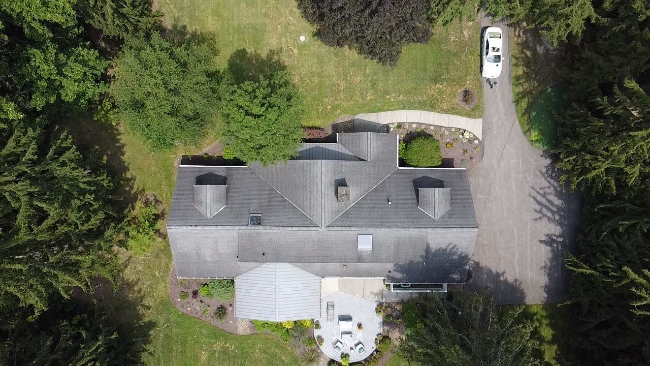 Moreland Hills Roof + Gutters Replacement by Atlas Roofing & Restoration