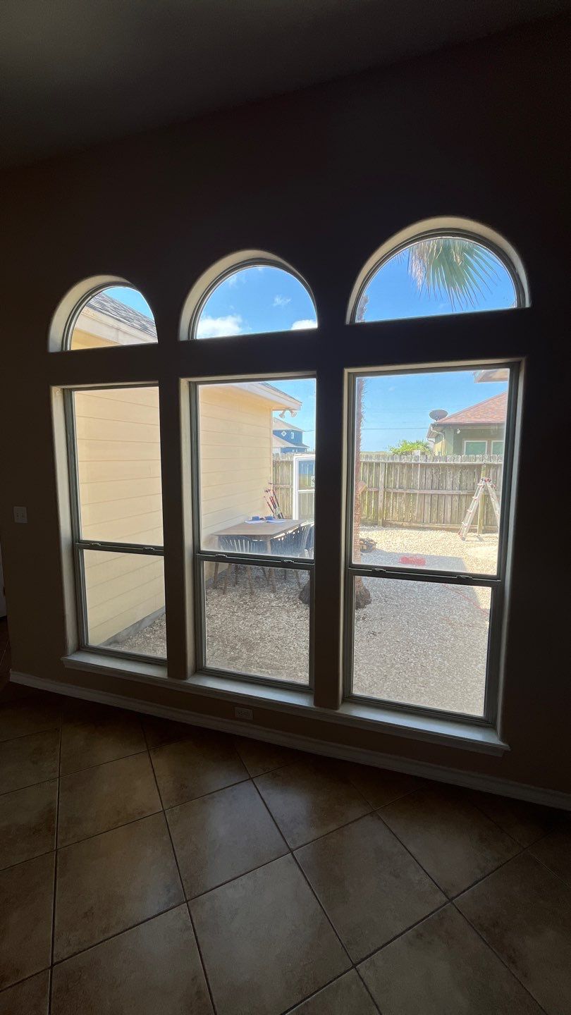 Curved Trim Windows by Bayfront Roofing and Construction