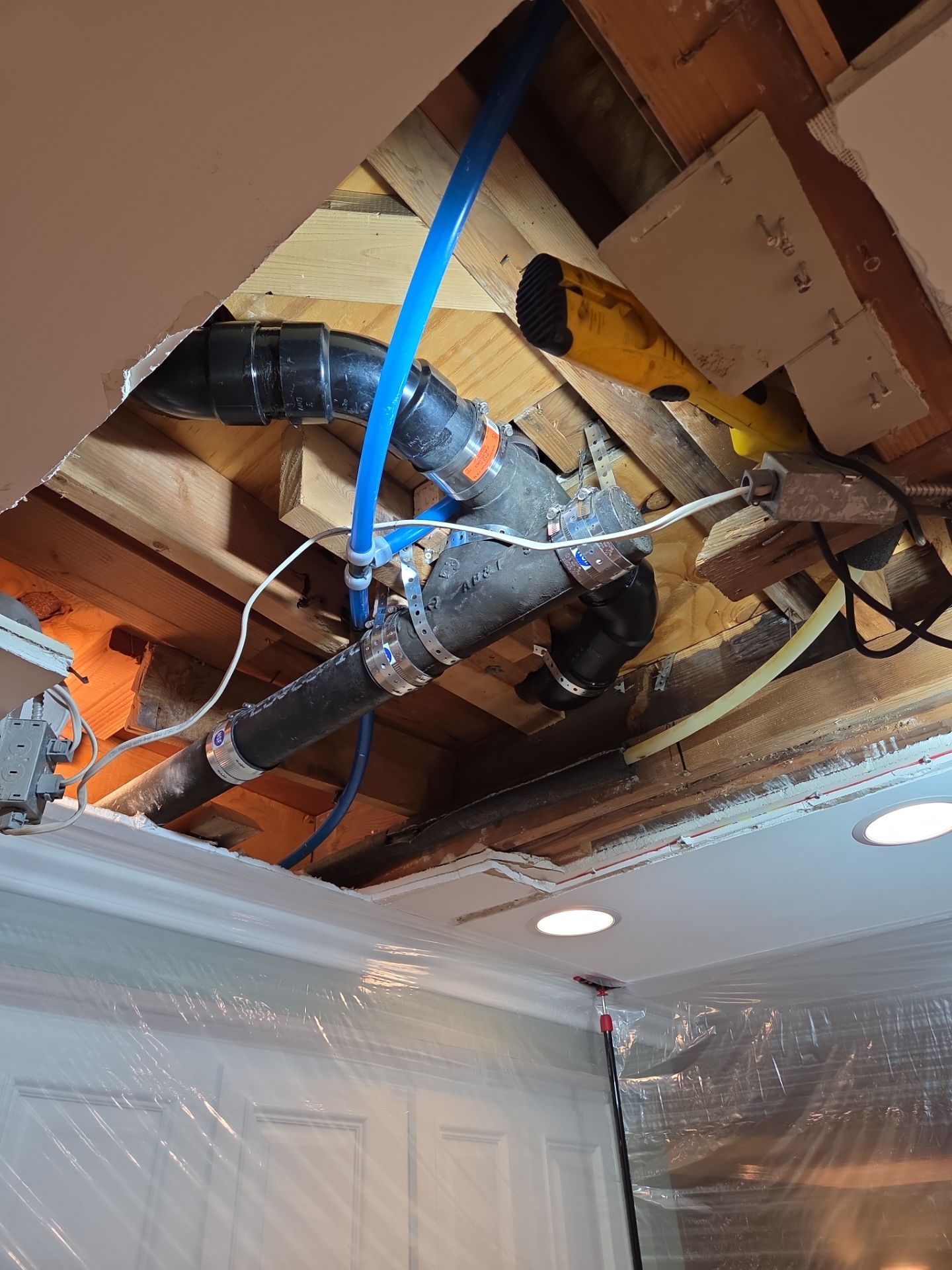 Dain line in Ceiling of Kitchen was bad by Professional Plumbing Inc 