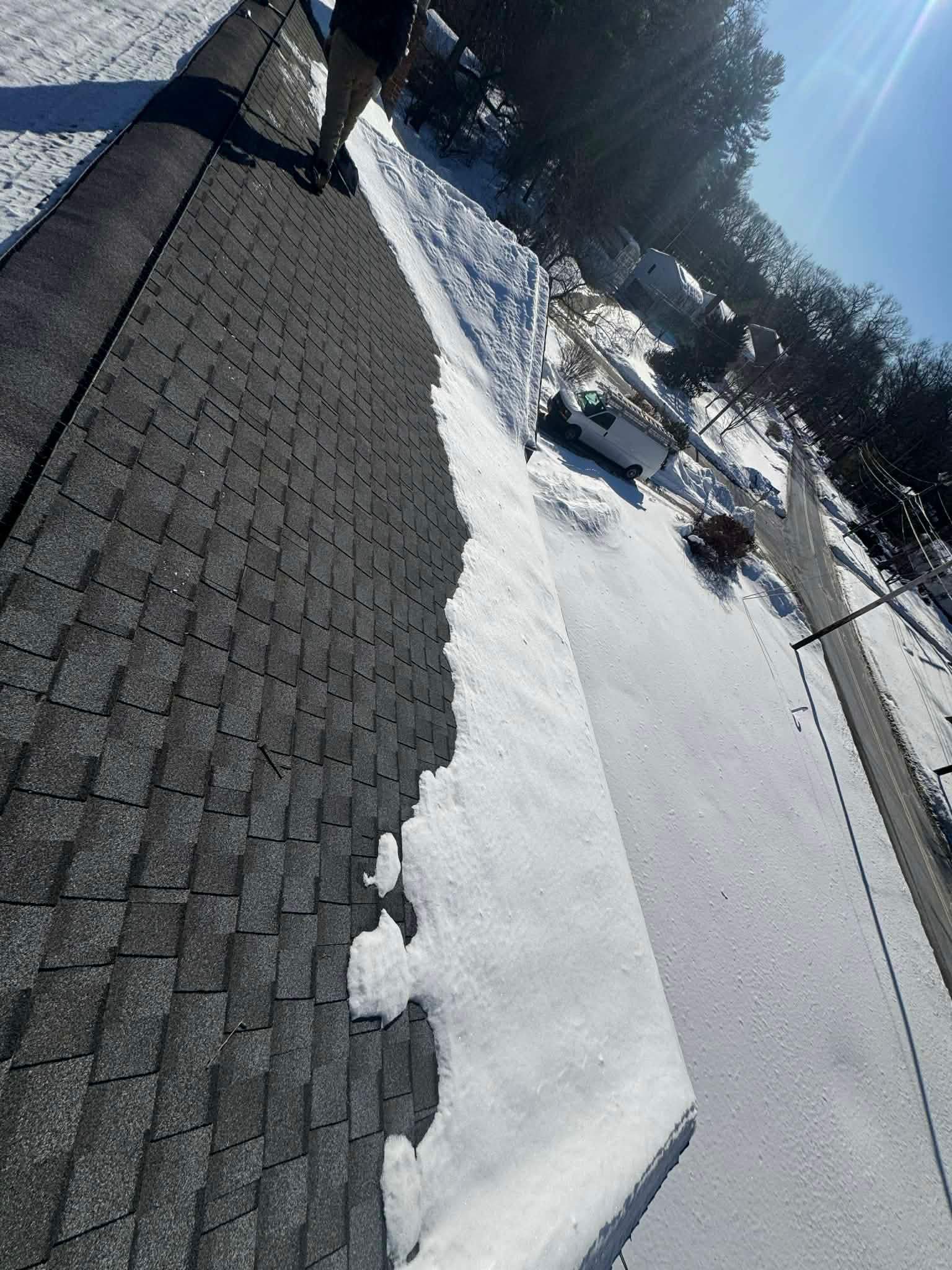 Ice Dam Removal & Snow Removal in Tewksbury, MA by Mighty Dog Roofing of Greater Middlesex County