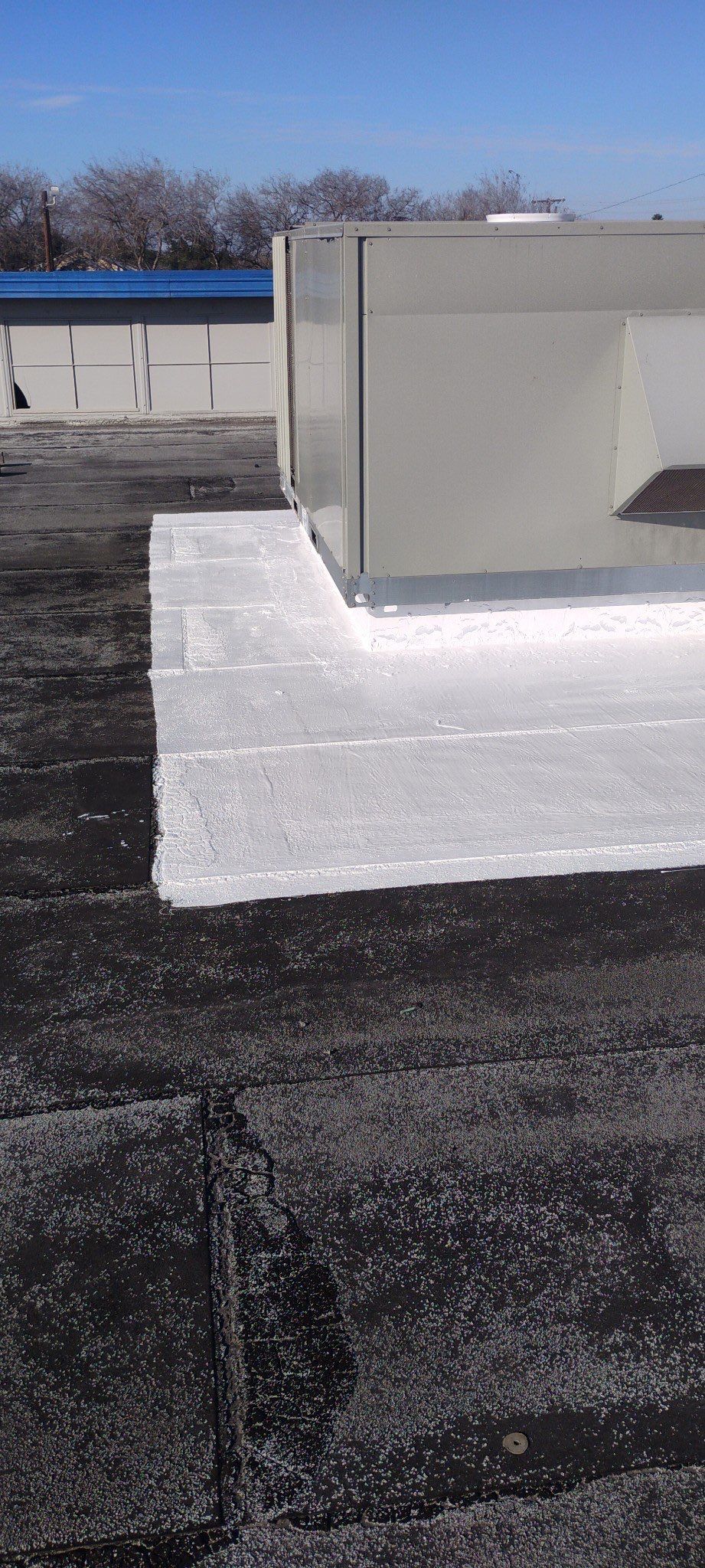 Commercial Silcone Roof Repair using Silcone Coating by Galvan Roofing and Construction