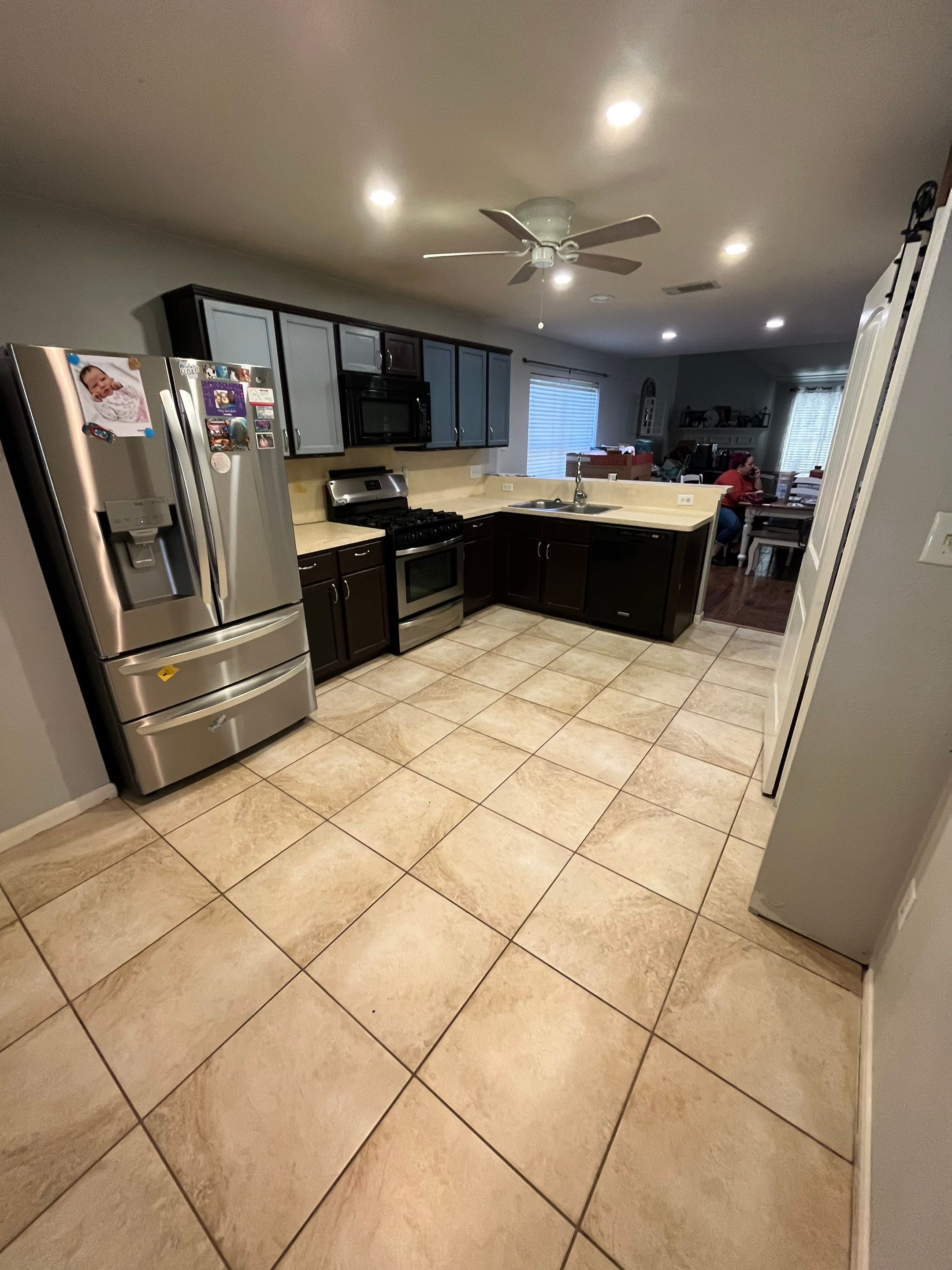 Modern Kitchen Remodel with Blue Cabinetry by Majesty Construction