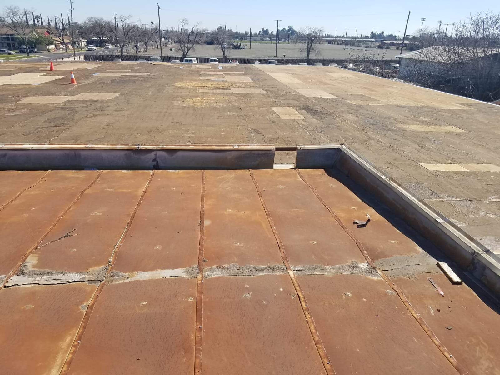Spray foam and coatings using Conklin Benchmark/PUMA XL coatings and spray foam by Straight Edge Roofing Inc