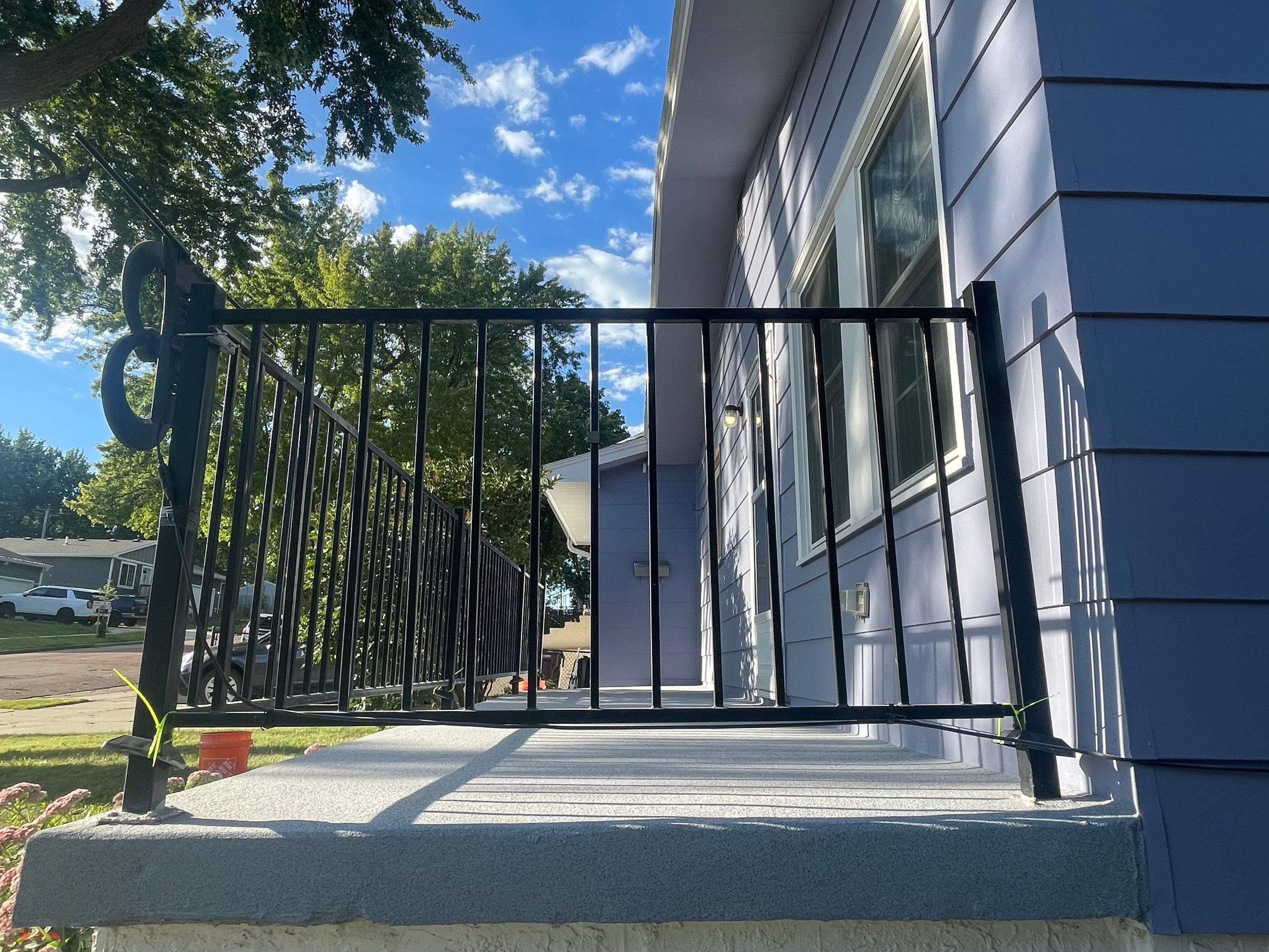 Sioux Falls Concrete Porch Coating with Starry Evening Finish by Select Painting, Coatings & Garage Cabinets