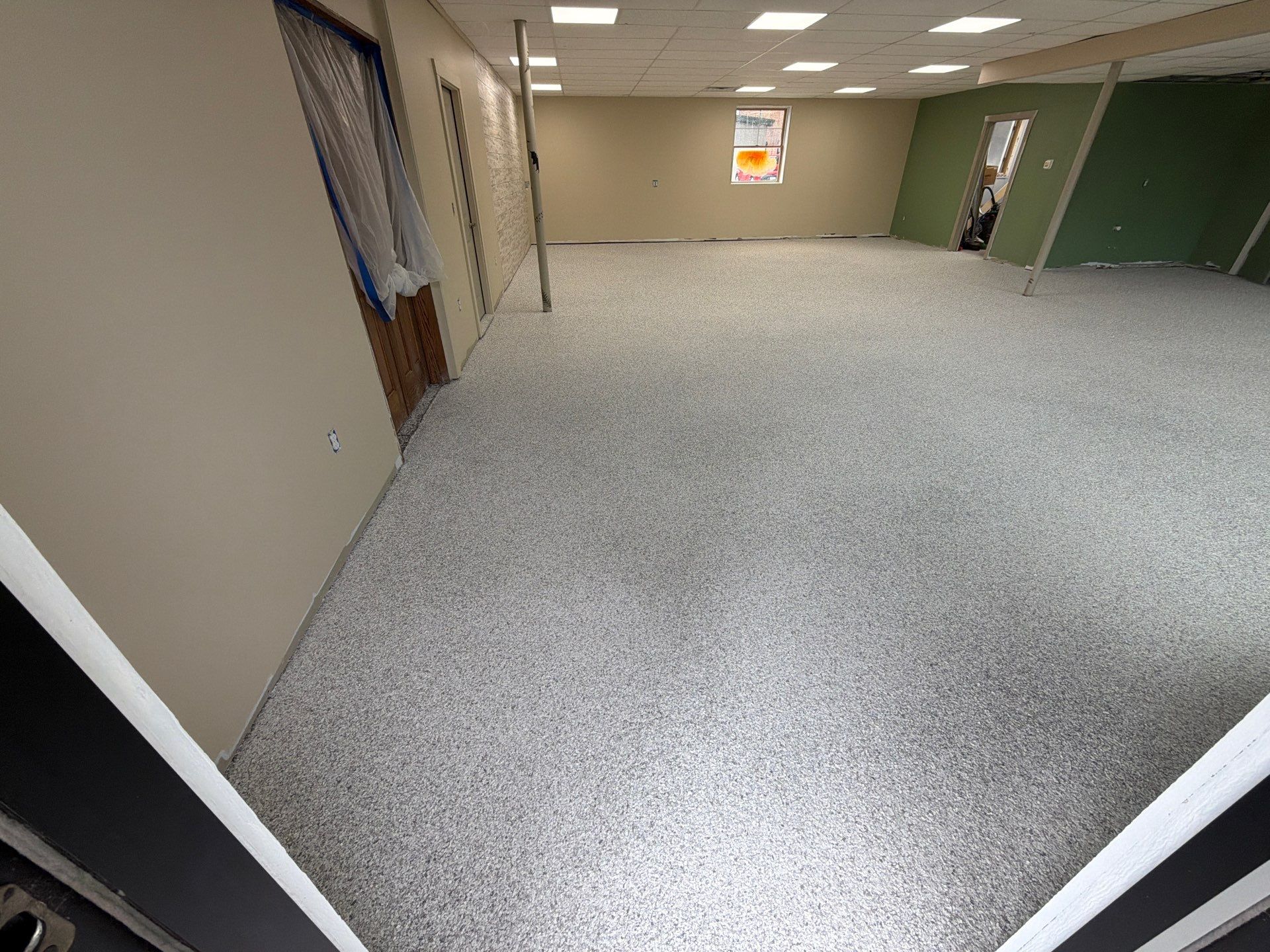 Commercial Epoxy Flake Floor Installation and Concrete Refinishing in Montague by Gordon Painting