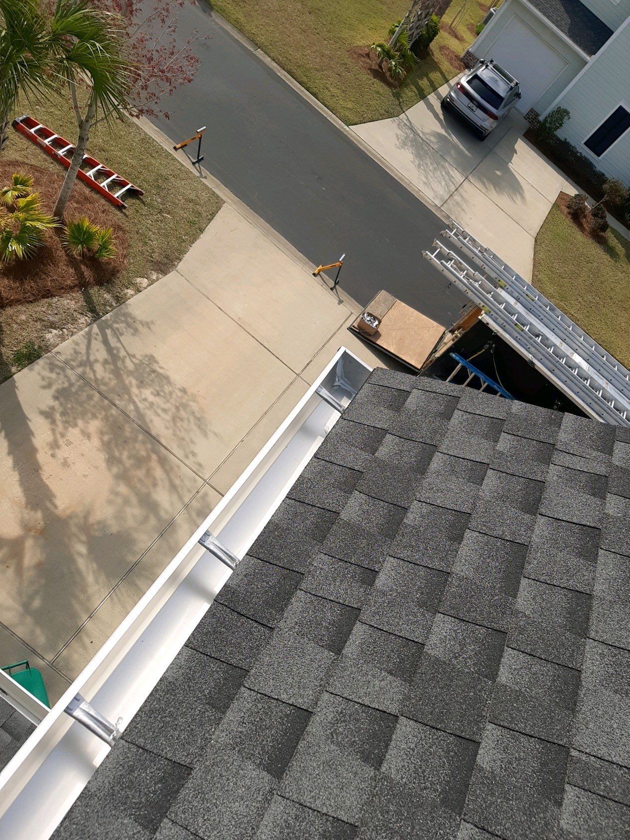 Gutter Installation Using White K-Style 6 Inch Seamless Gutters by Gutter Professors