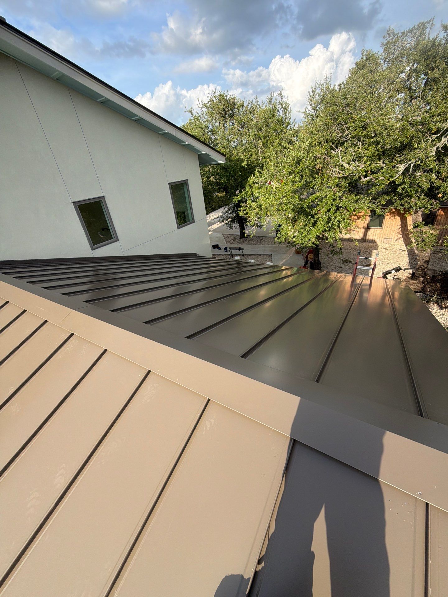 Residential Roof Replacement using 24 GA Double-Lock - Medium Bronze by Action Exteriors Austin