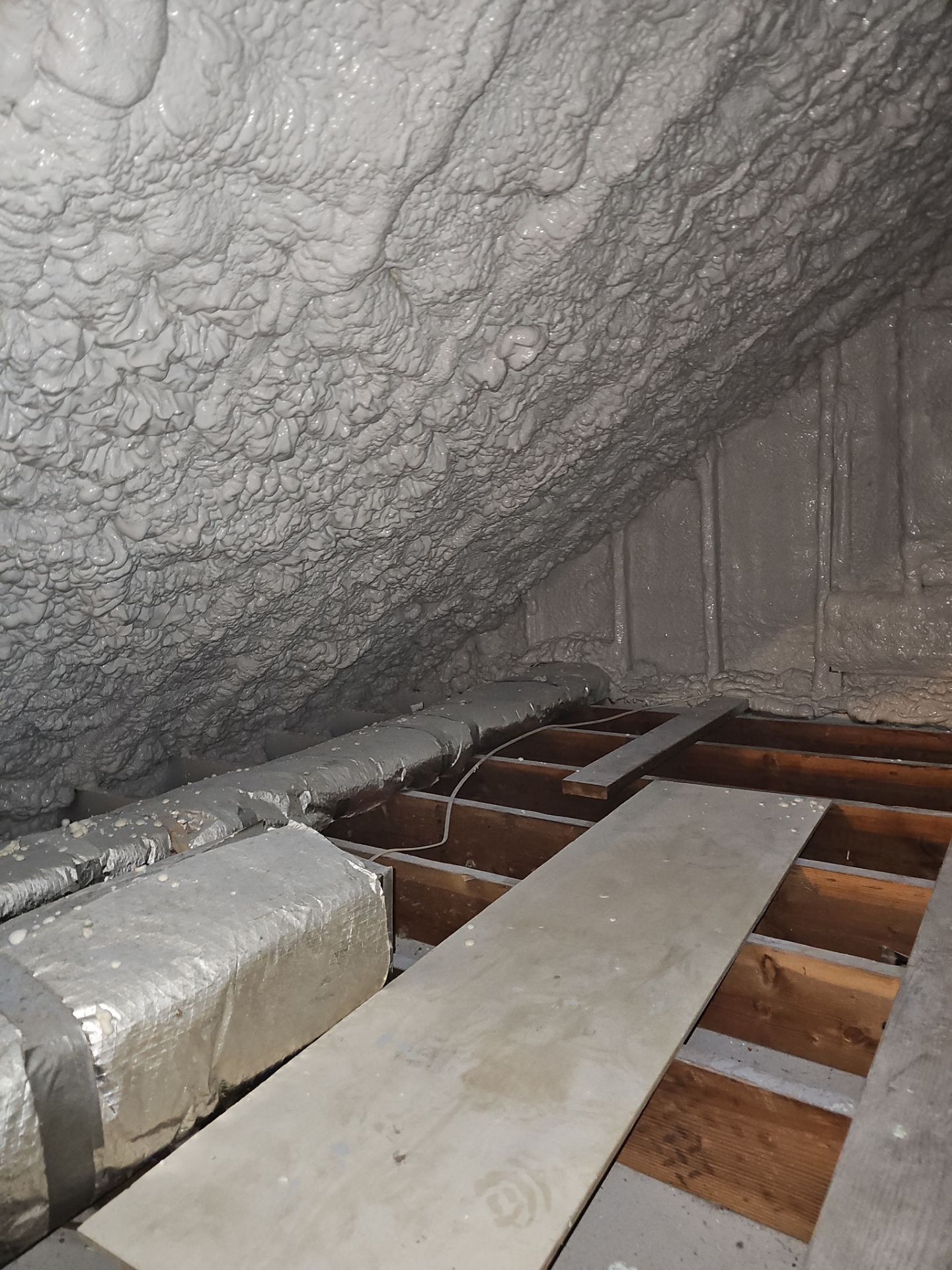 Attic Retrofit using open cell spray foam by NYS Foam & Energy