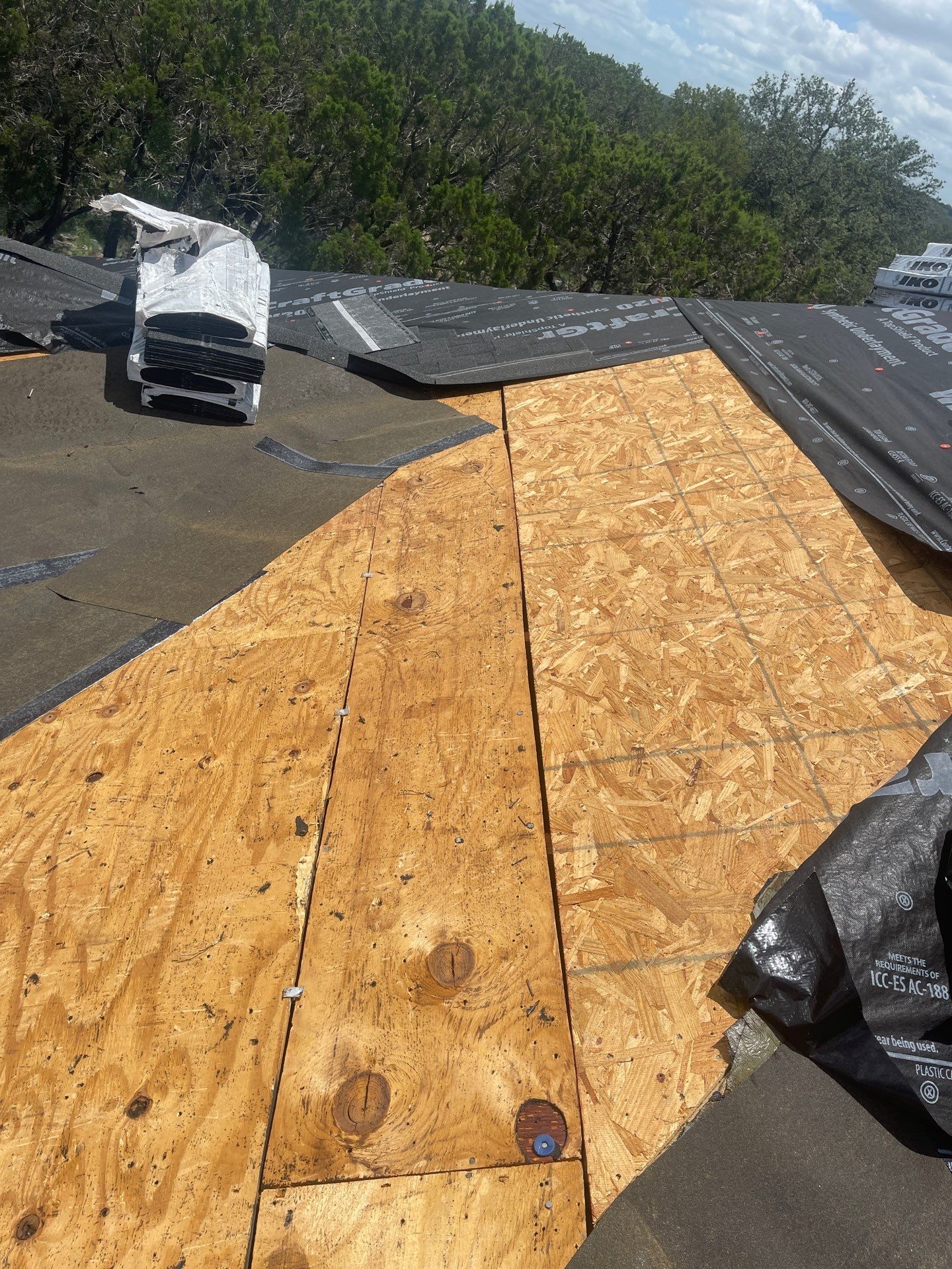 Residential Roofing Installation using IKO Nordic Granite Black by DeZign Roofing & Exteriors