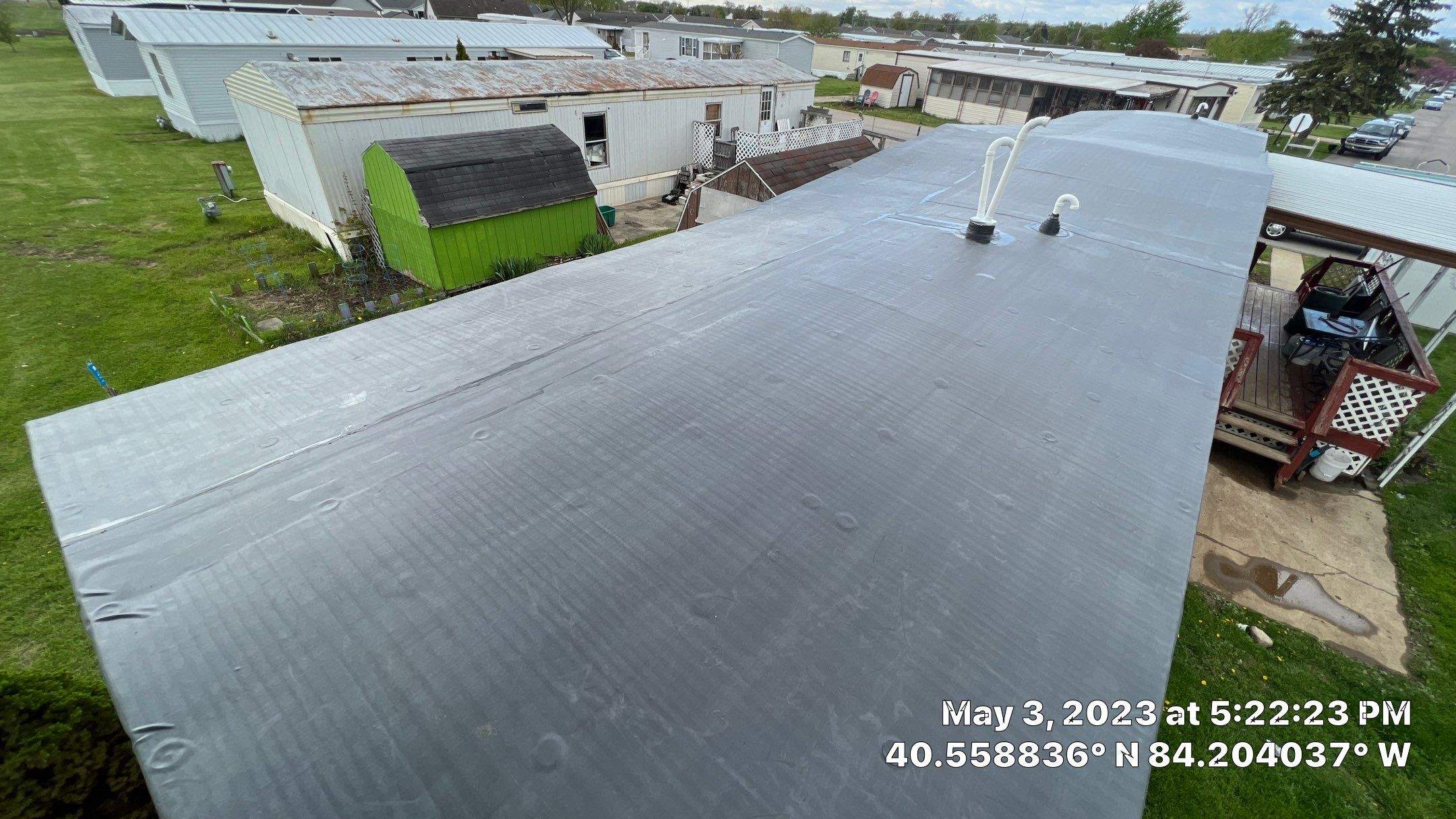 Residential Roofing Installation using 60 mil rubber roof  by Nitro Roofing and Construction