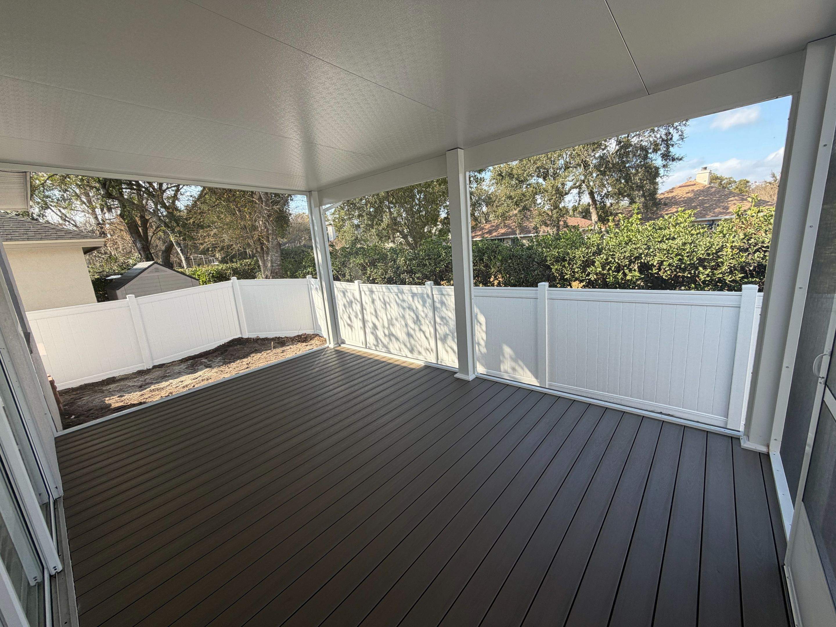 The Complete Backyard Retreat: Insulated Screen Room & Composite Deck by Orlando pergolas
