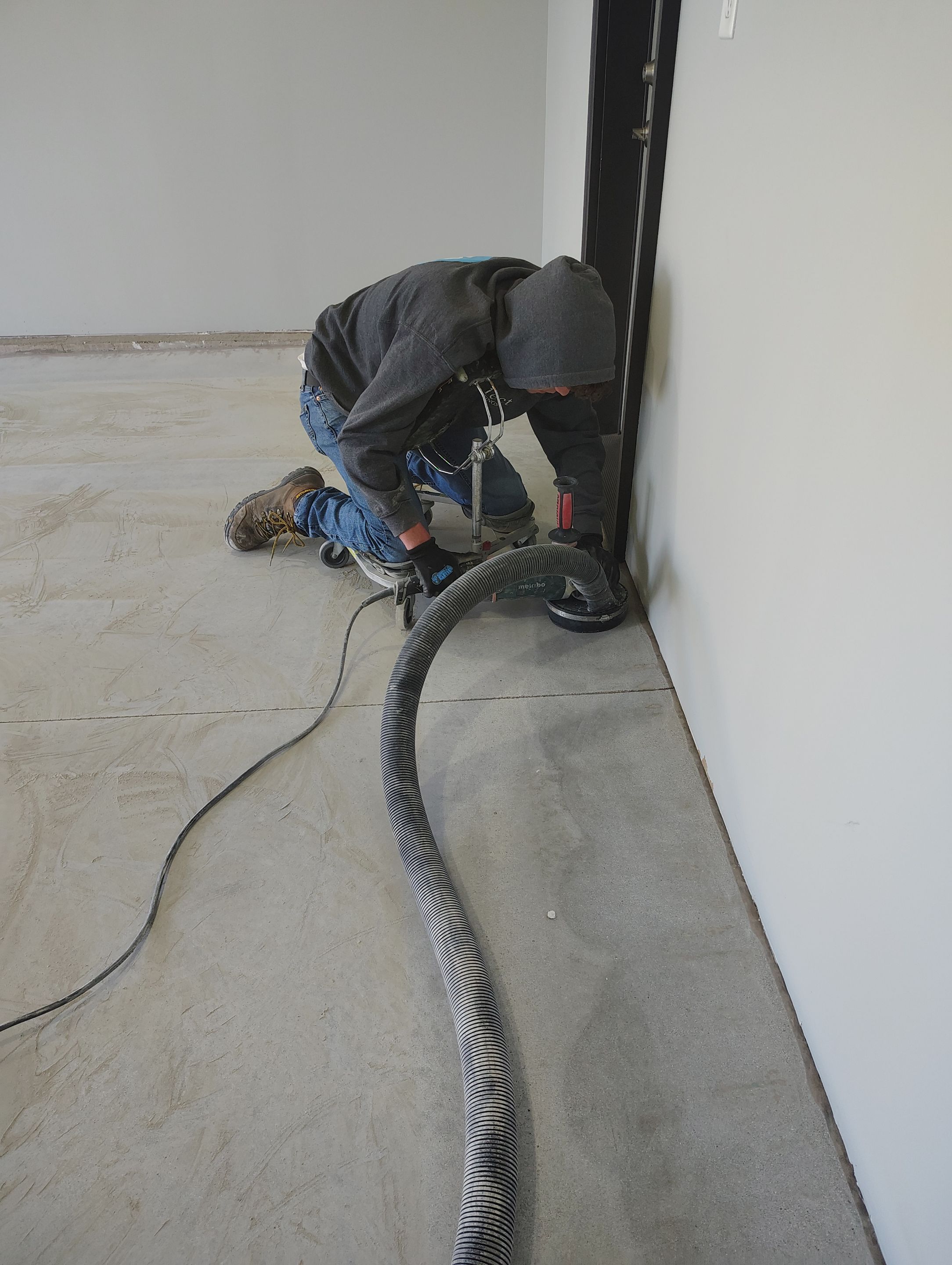 Custom Epoxy Garage Floor Coating Installation in Sioux Falls by Select Painting, Coatings & Garage Cabinets
