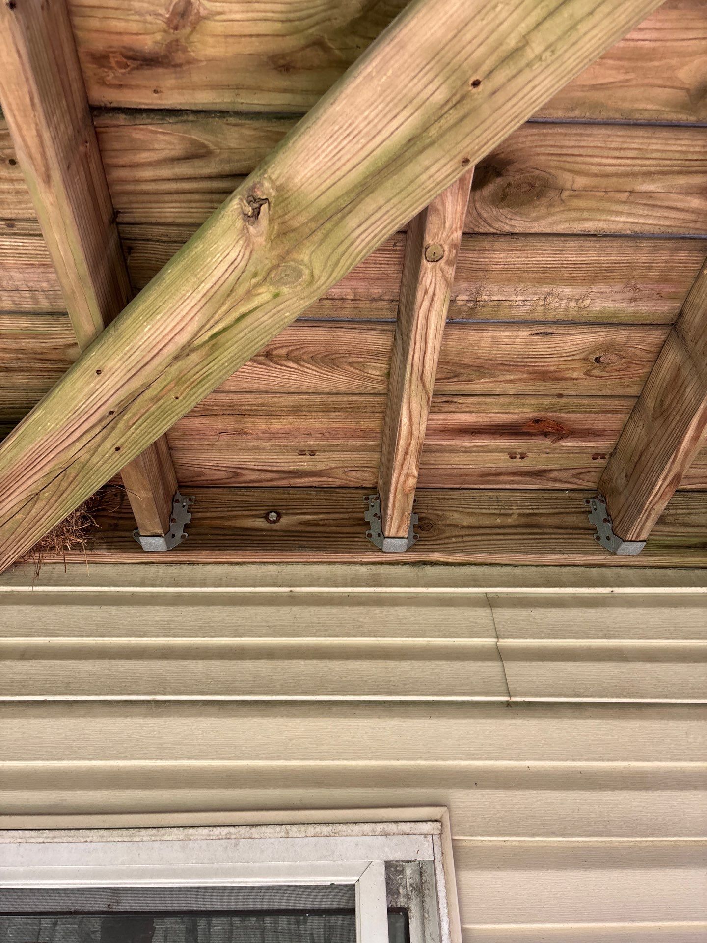 Third-Floor Window Capping Reinstallation After Storm Damage by Laser Focused Solutions LLC