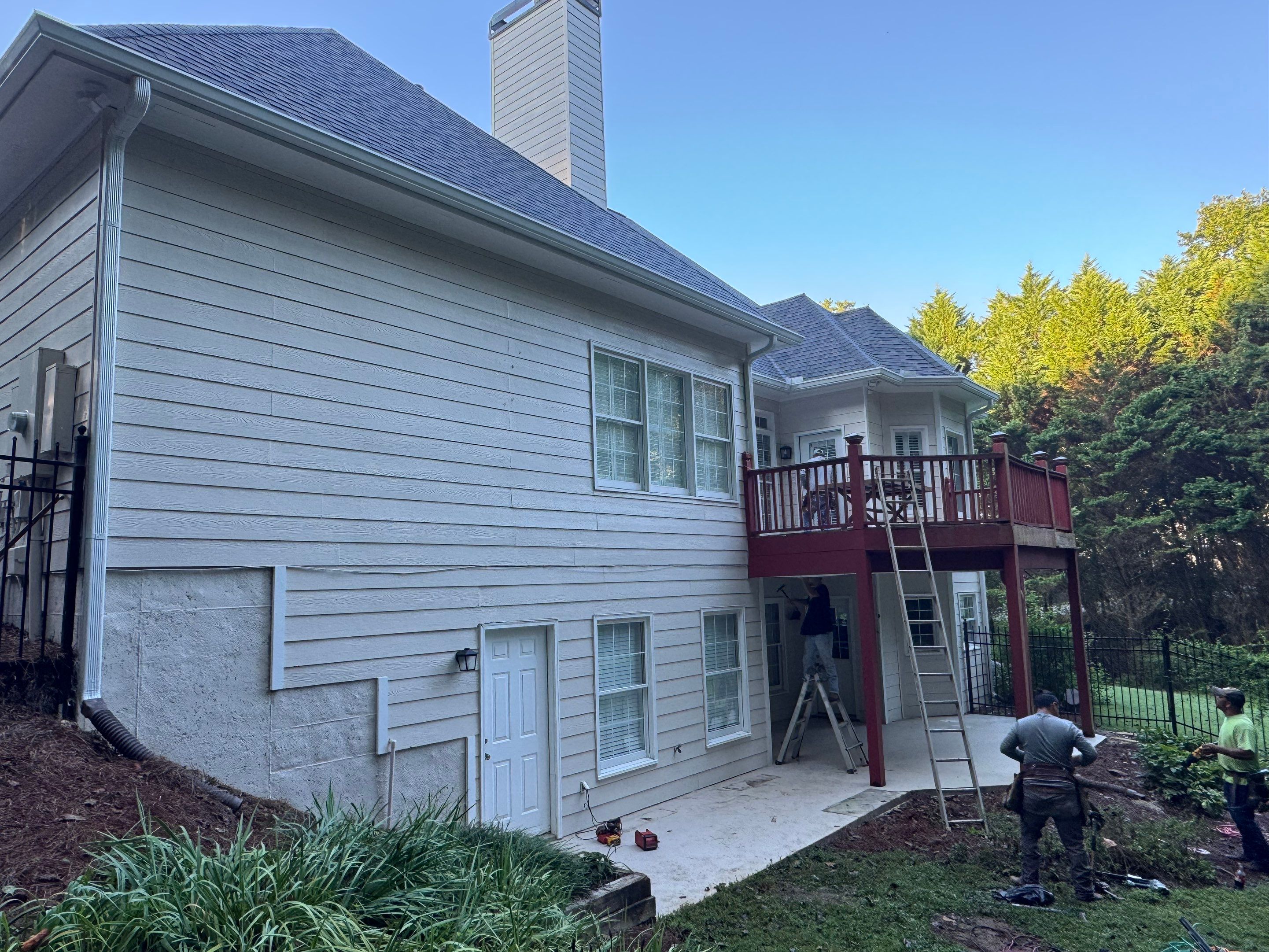 Elevated Composite Deck Replacement with Metal Railings in Smyrna by Swift Home Renovations 