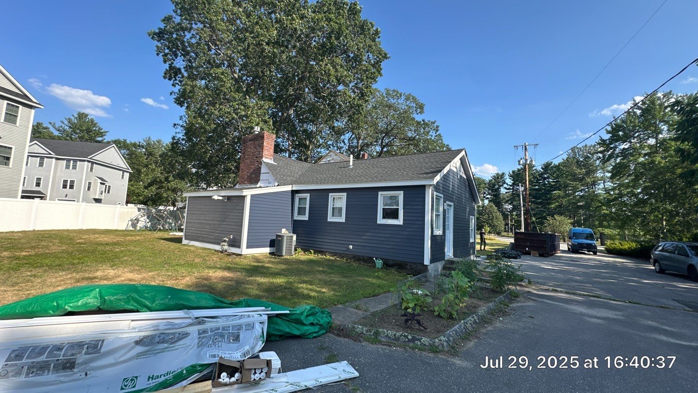 James Hardie Lap Siding Installation in Chelmsford, MA by Mighty Dog Roofing of Greater Middlesex County