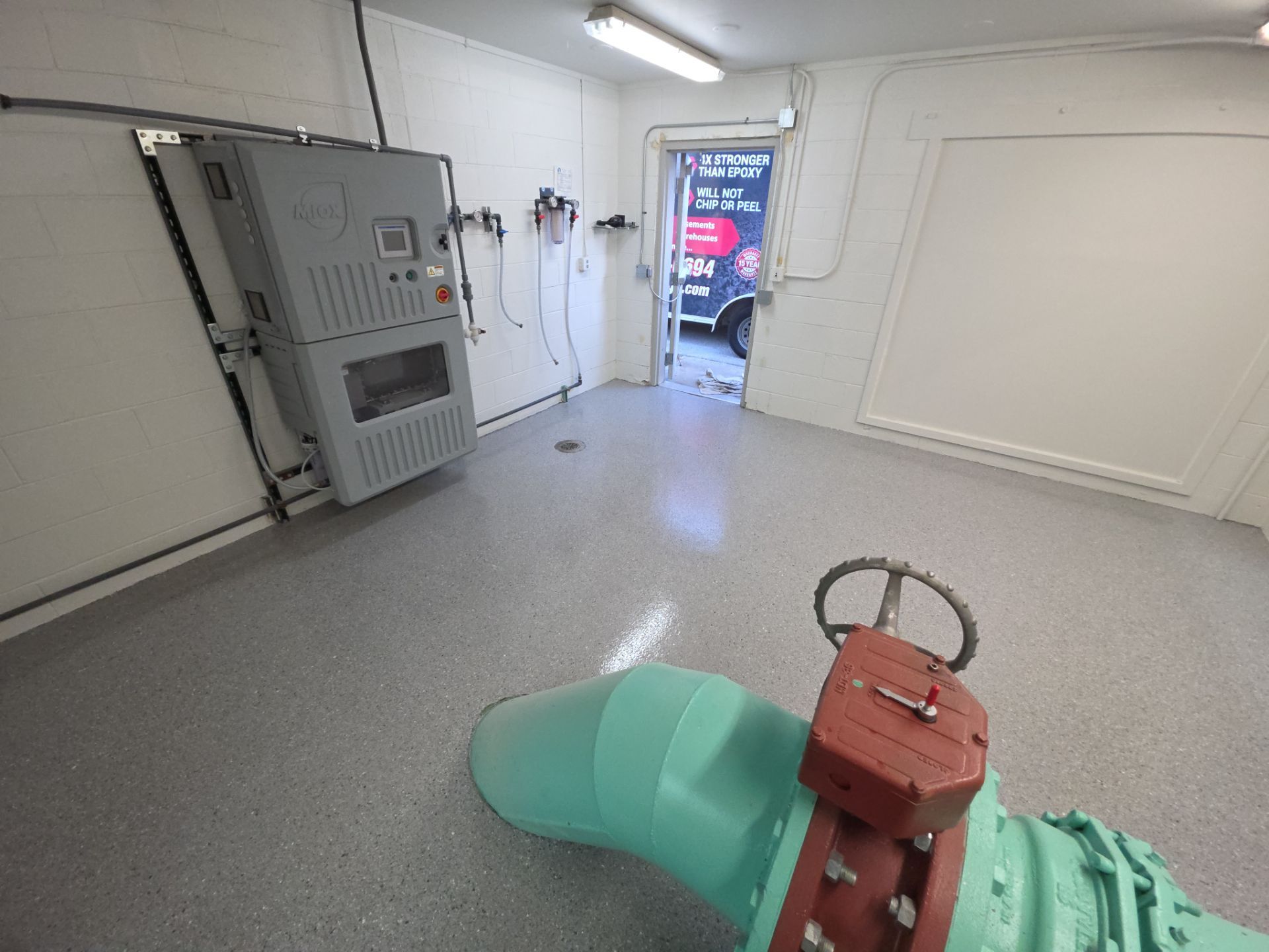 Commercial Floor Transformation using Battleship Hybrid by Croc Coatings, LLC