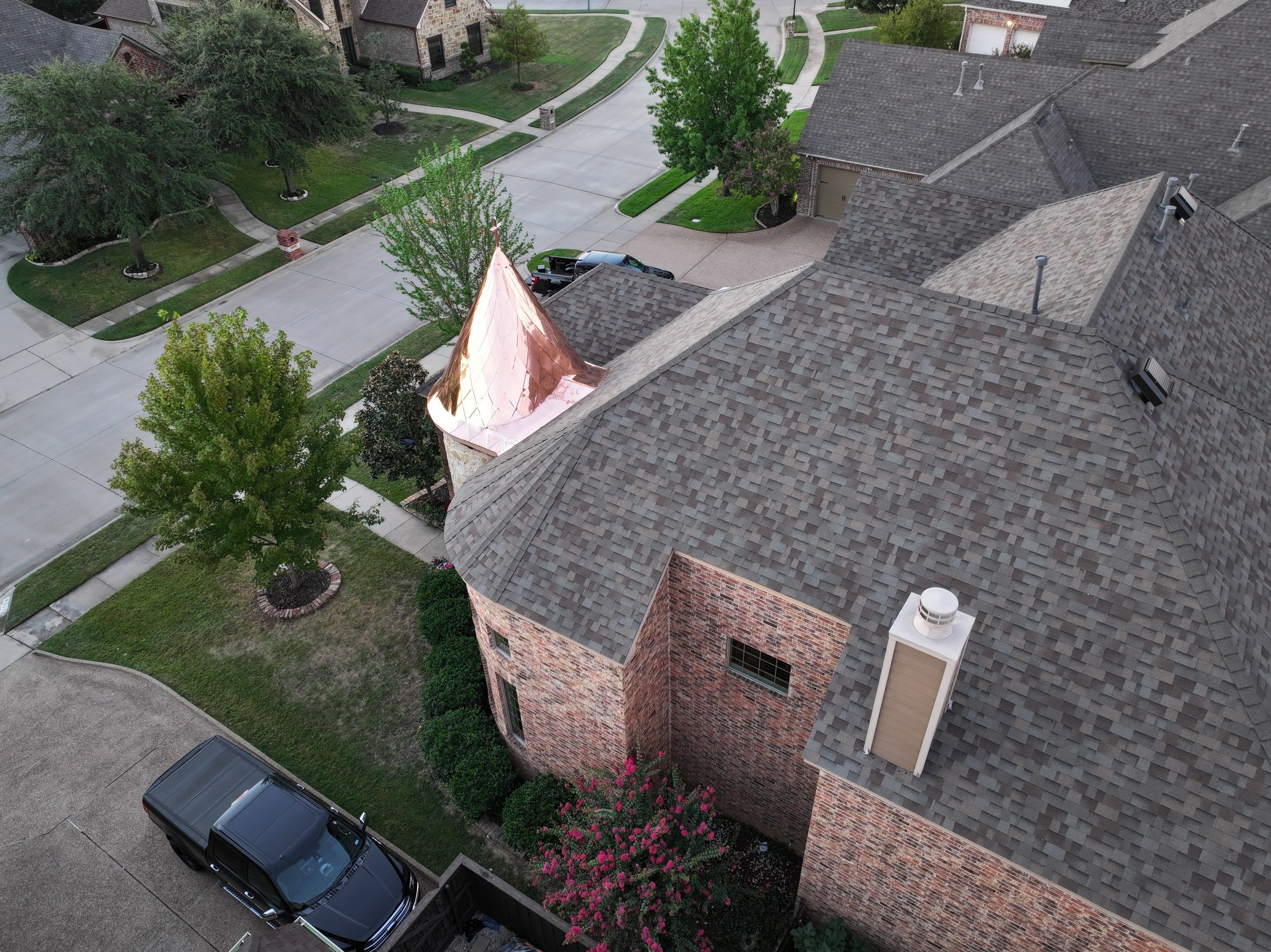 Installing Custom copper turret and Malarkey Vista Class 4 shingles Hail Damage Upgrade by Becker Roofing and Exteriors
