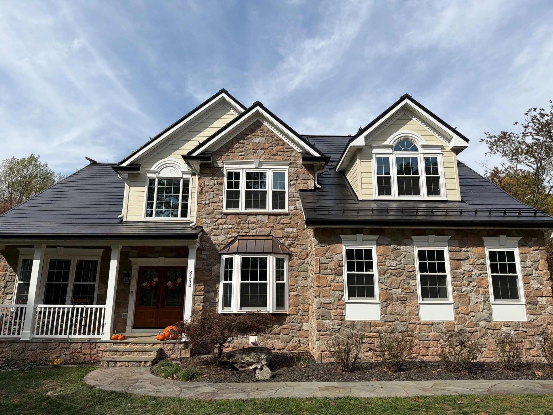 Beautiful James Hardie Siding & Tesla Solar Roof by American Home Contractors