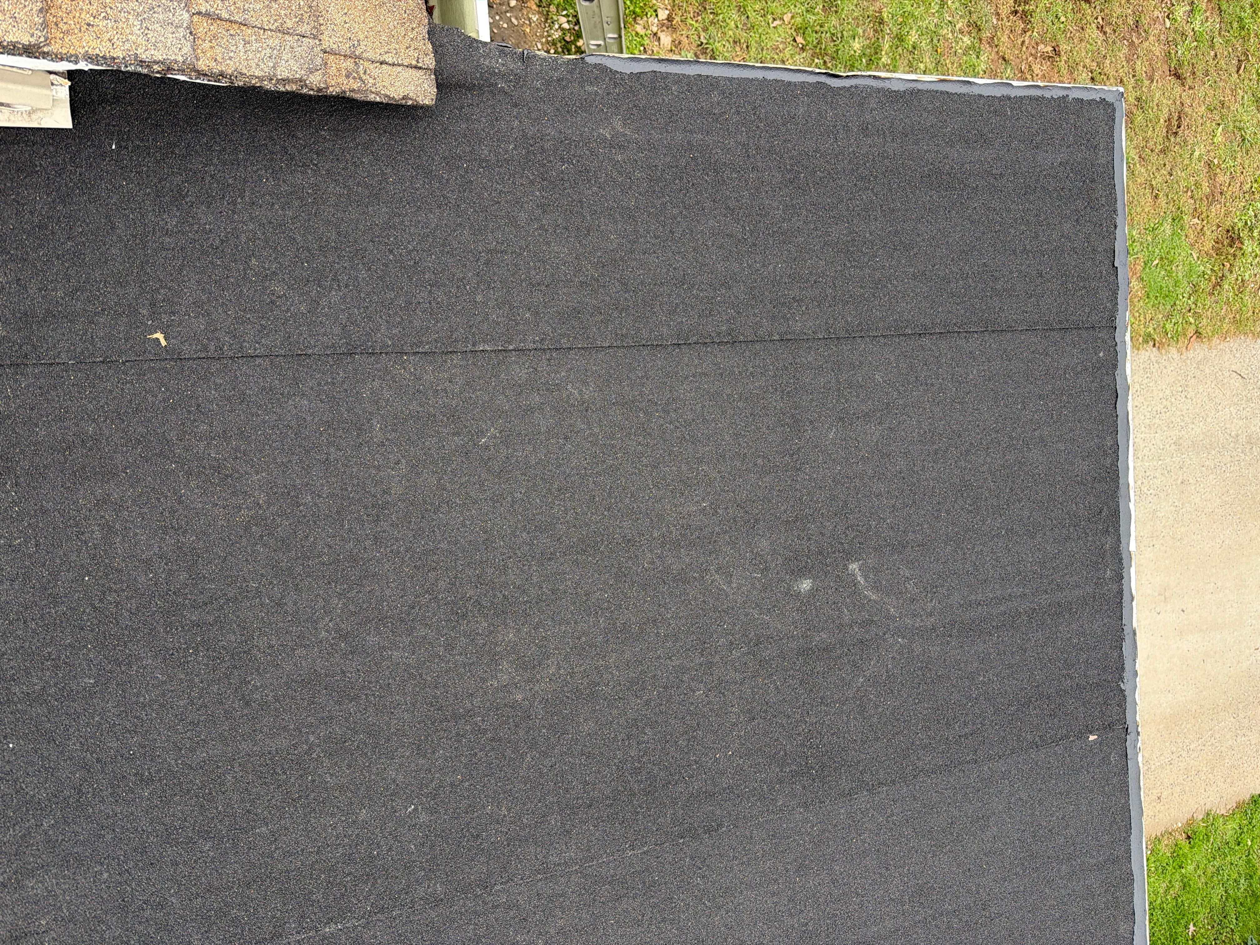 Flat Roof Replacement and Shingle Integration in Levittown by Stofan Construction LLC