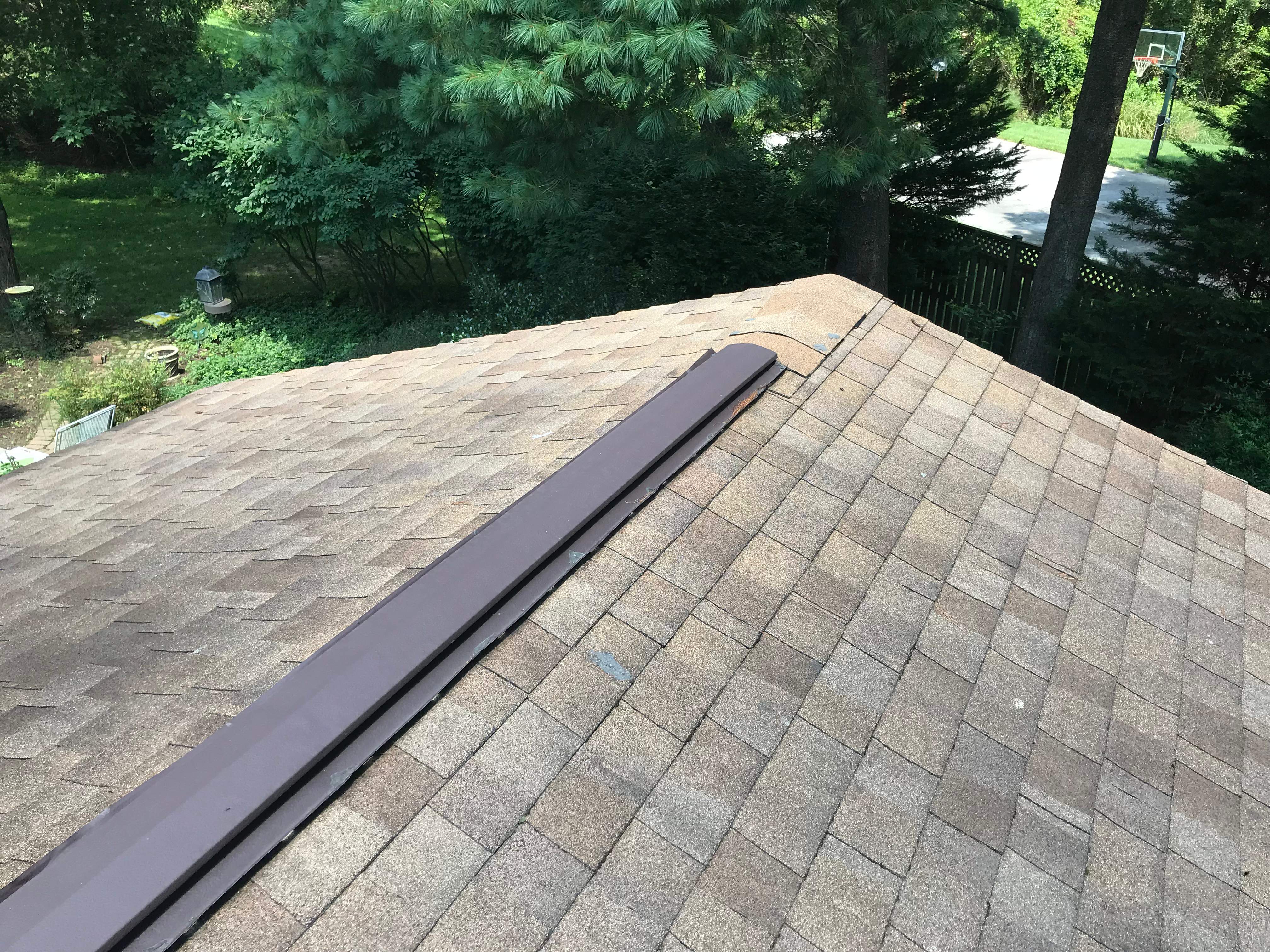 Residential Roofing Installation using Landmark Shingles Color Weatherwood by Alpha Design Services