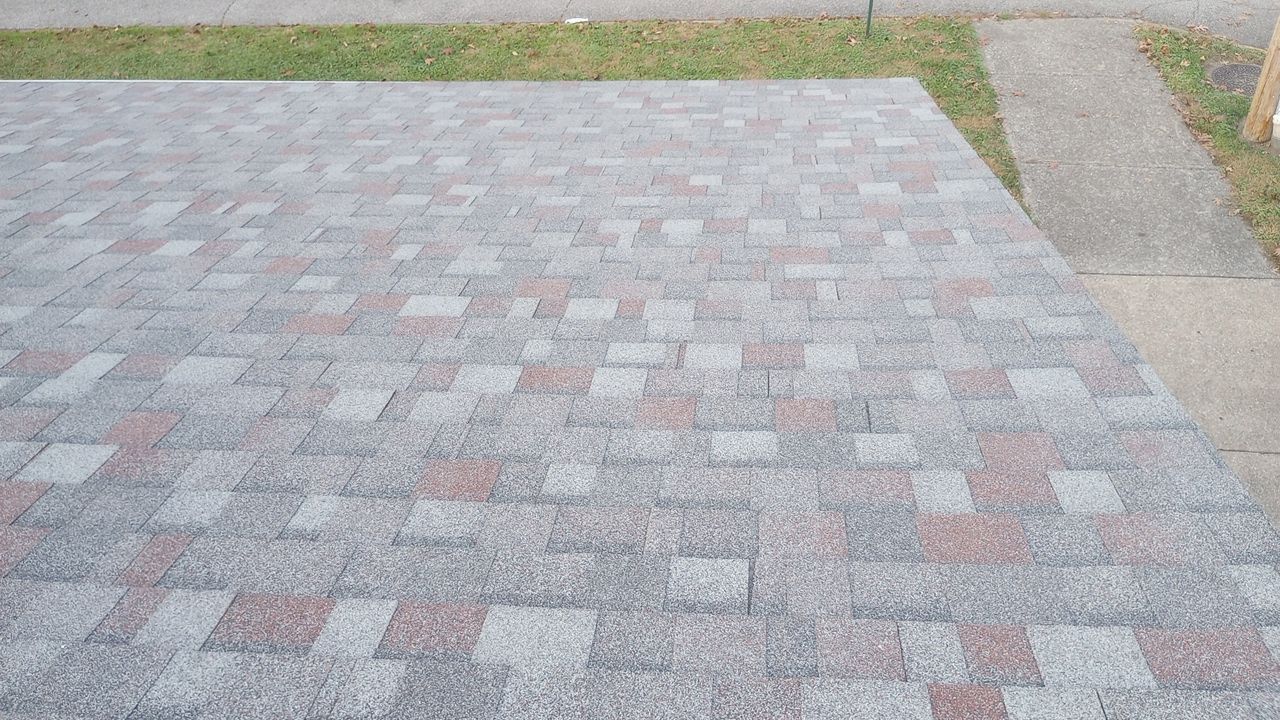 Commercial Roofing Installation using Performance Shingles by Mr. Roofer