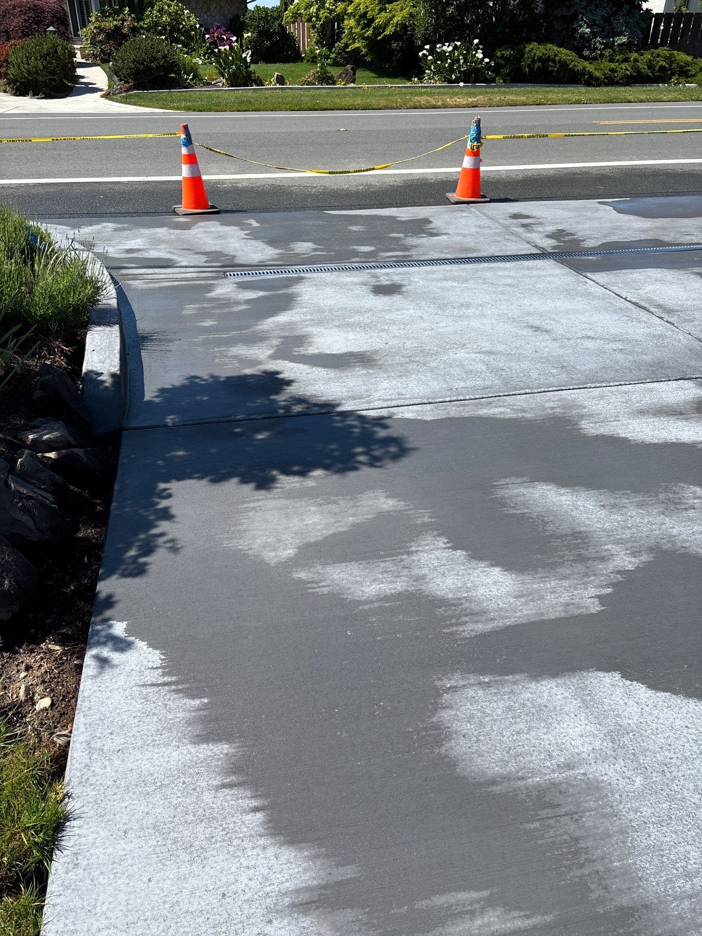 Colored Concrete Driveway Repair with Sealer| Everett    by Jireh Asphalt & Concrete Inc 