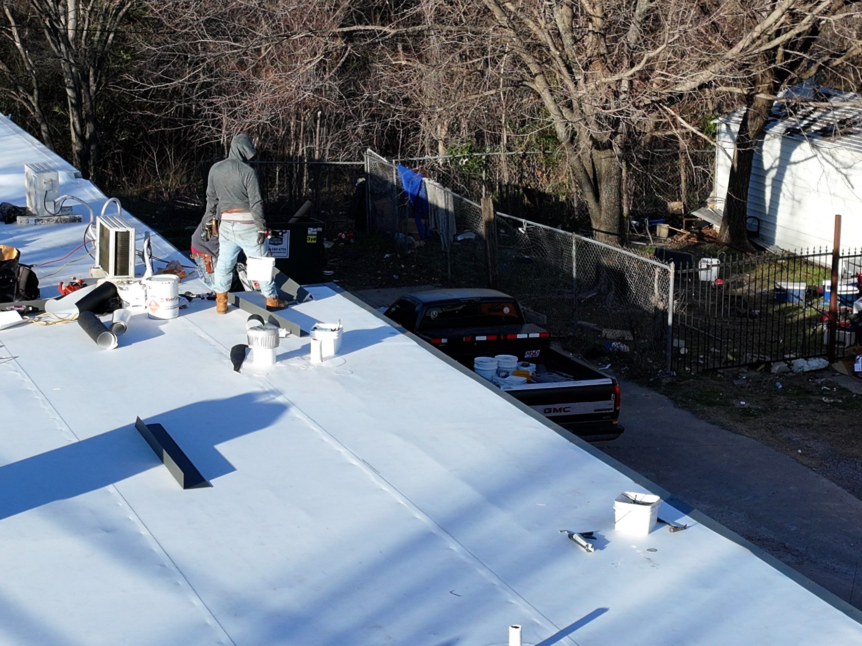 Commercial roofing overlay using GAF TPO over an old ballast roof by Becker Roofing and Exteriors