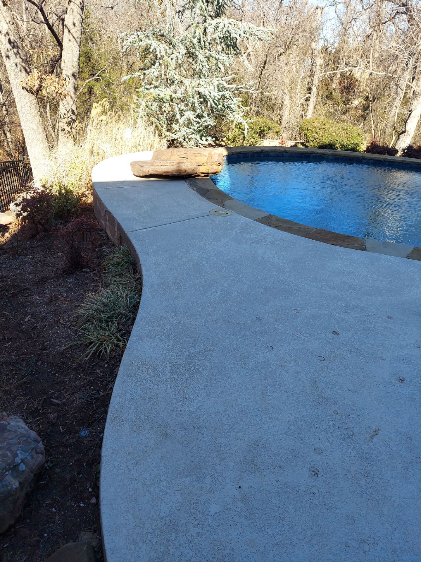 Pool Deck Install with Pebble Beach by Copperhead Coatings