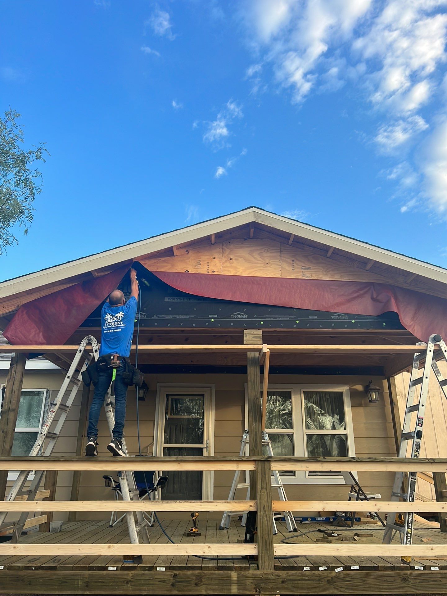 Front Porch Sitt'n by Bayfront Roofing and Construction
