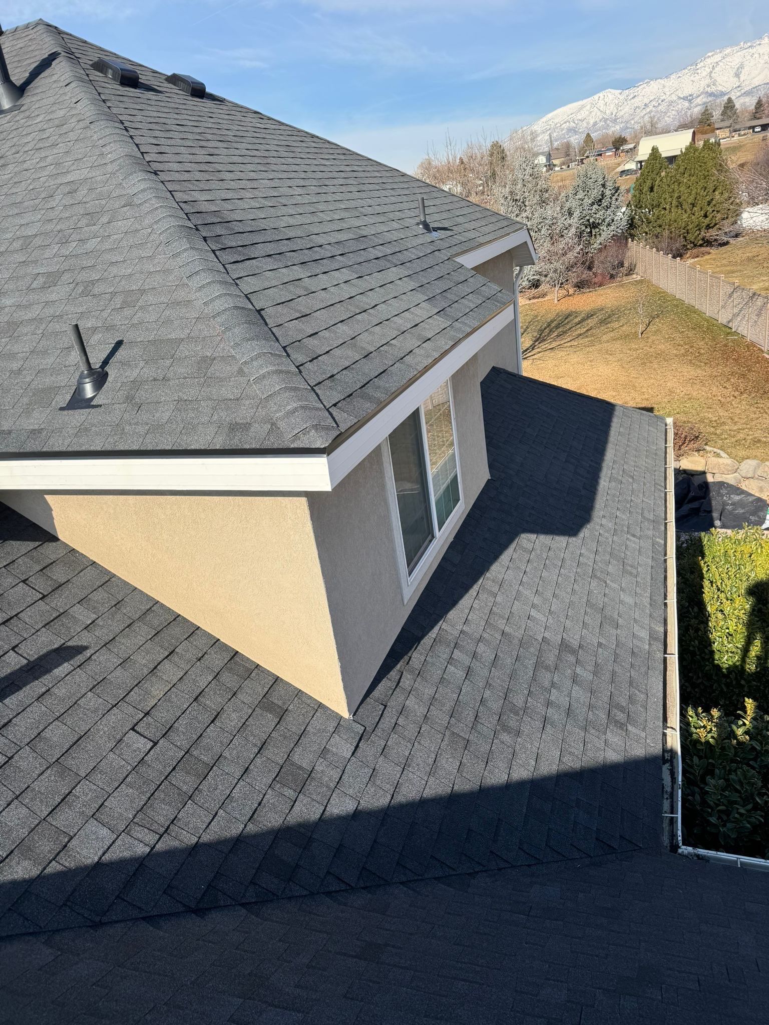Charcoal Gray Shingles by Reimagine Roofing