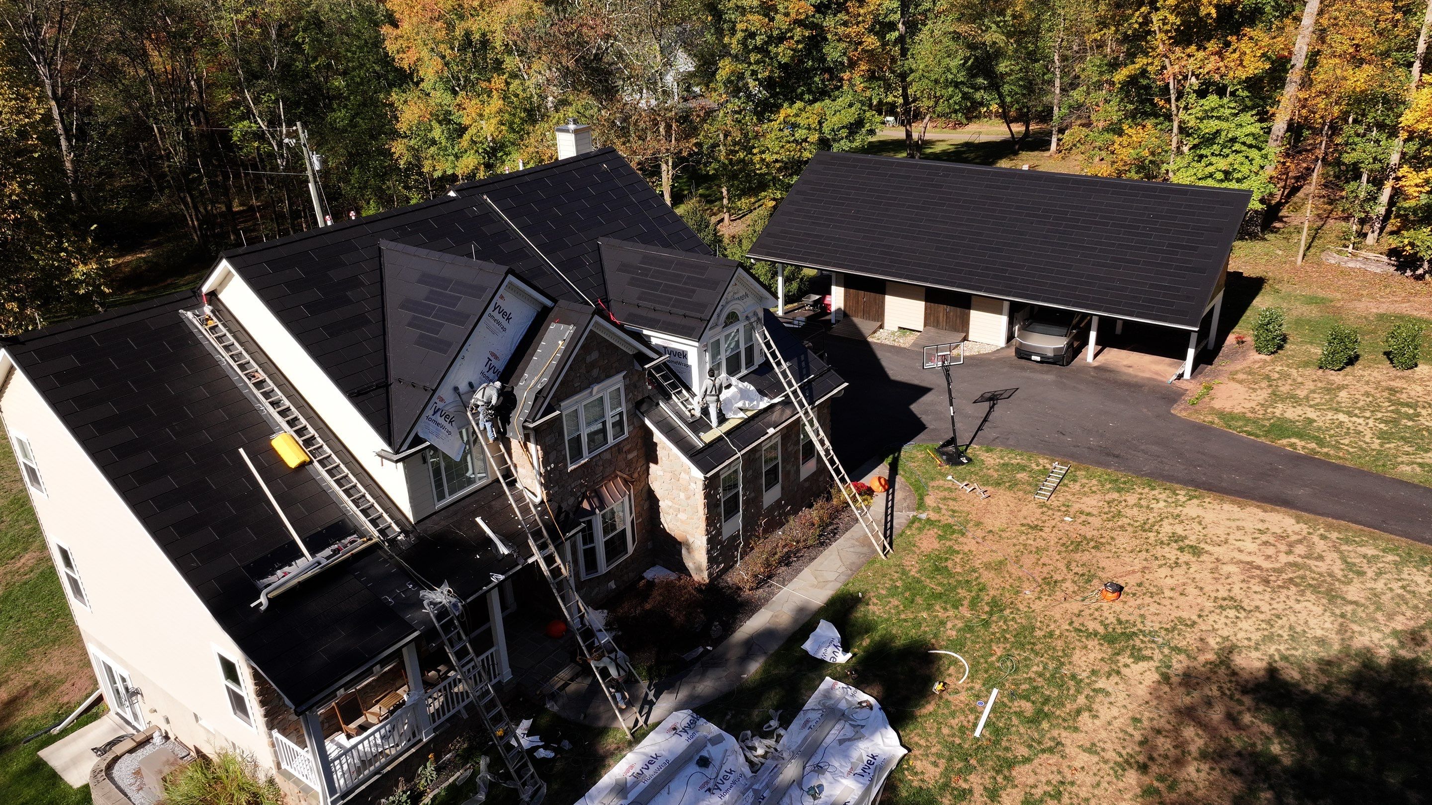 Beautiful James Hardie Siding & Tesla Solar Roof by American Home Contractors