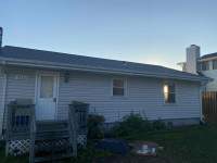 Siding Installation using JH Select Cedarmill Eased Edge by ExteriorPros