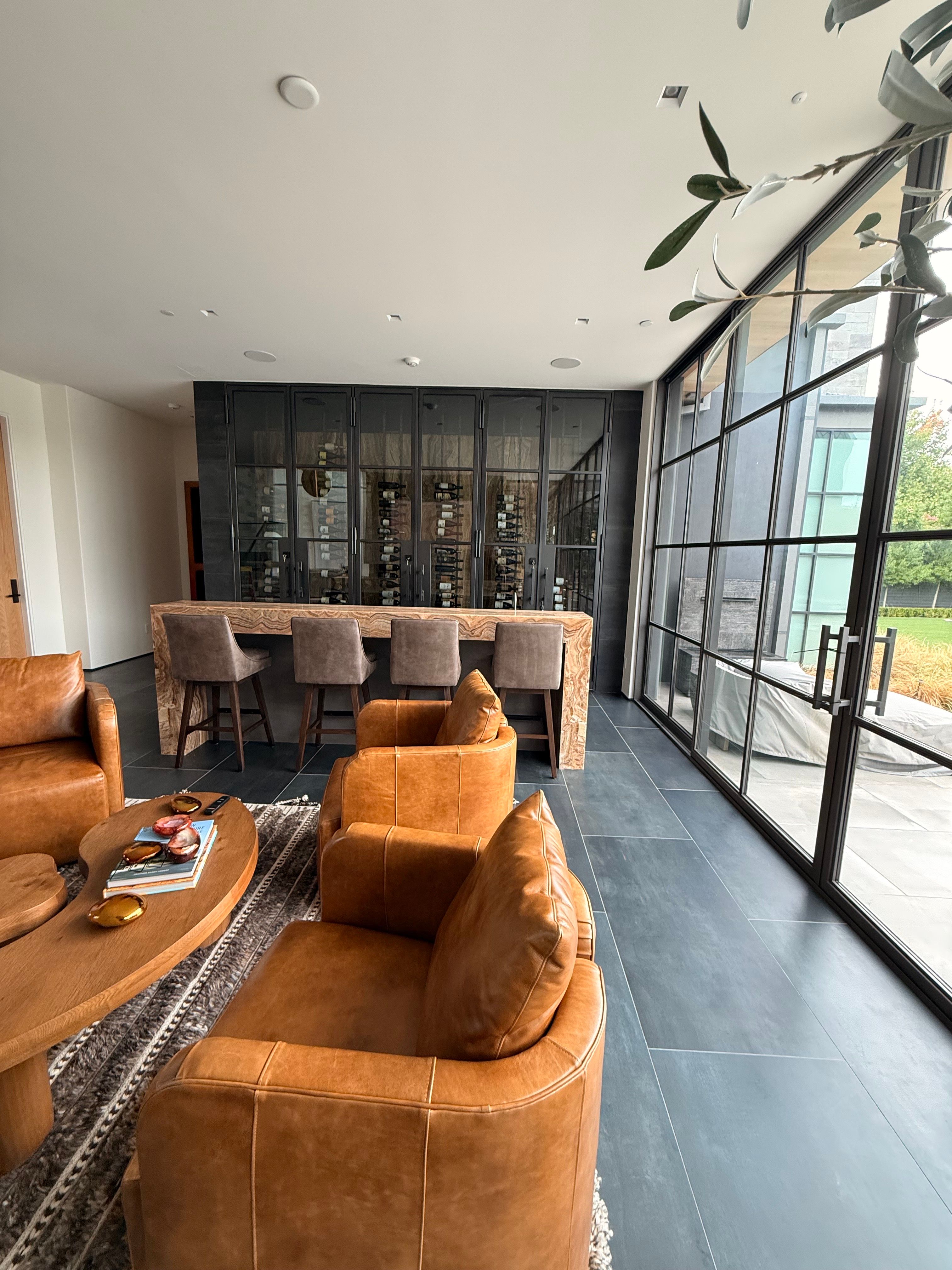 Custom Black-Framed Glass Wine Cellar Installation in Dallas by Solara Custom Living