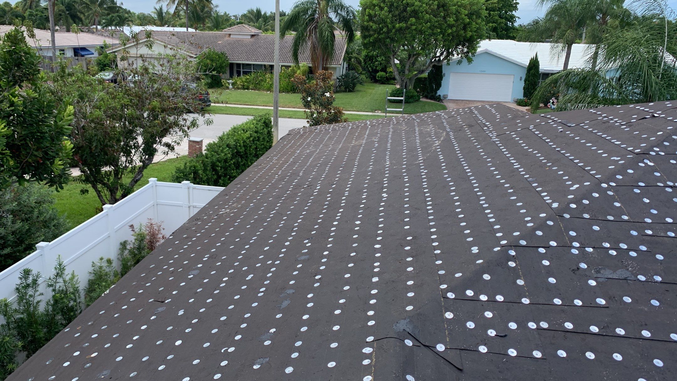 Residential Roofing Installation using 1" Nail strip metal roof by BLUES BROTHERS ROOFING