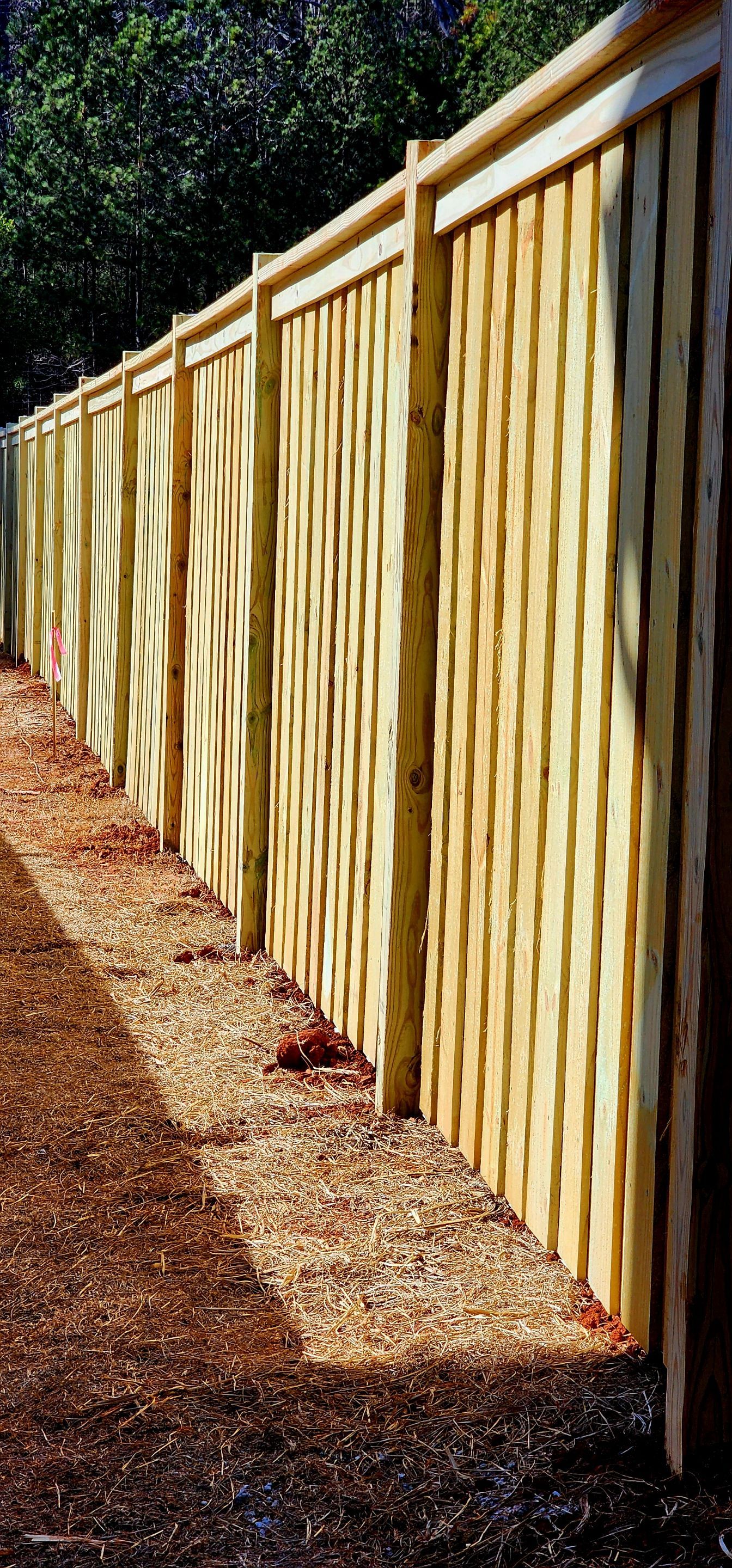 Fence Installation of Board on Board Capped Privacy by Titans of Timber Fence & Stain