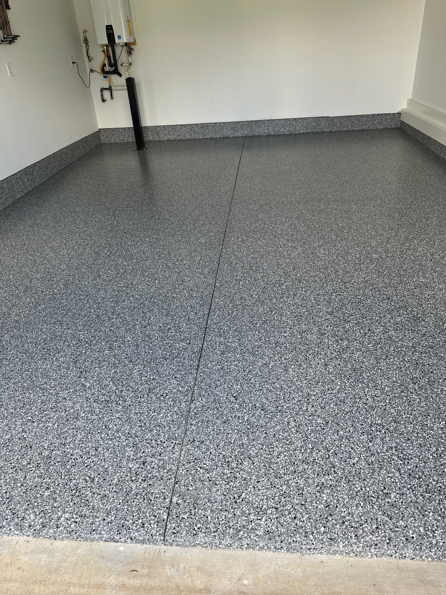 Garage Floor Coating using Wombat by My Garage Floor Guys