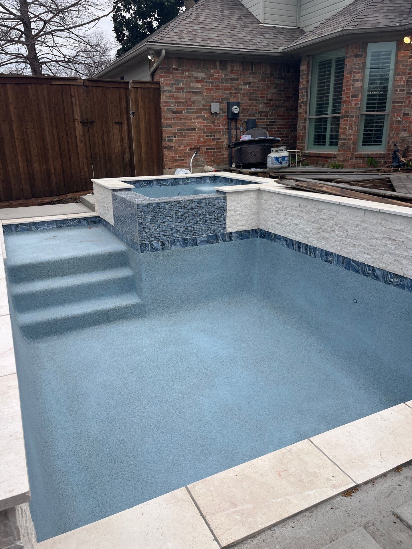 Geometric Pool and Spa with Glass Tile Walls by Pinnacle Pools and Spas - DFW
