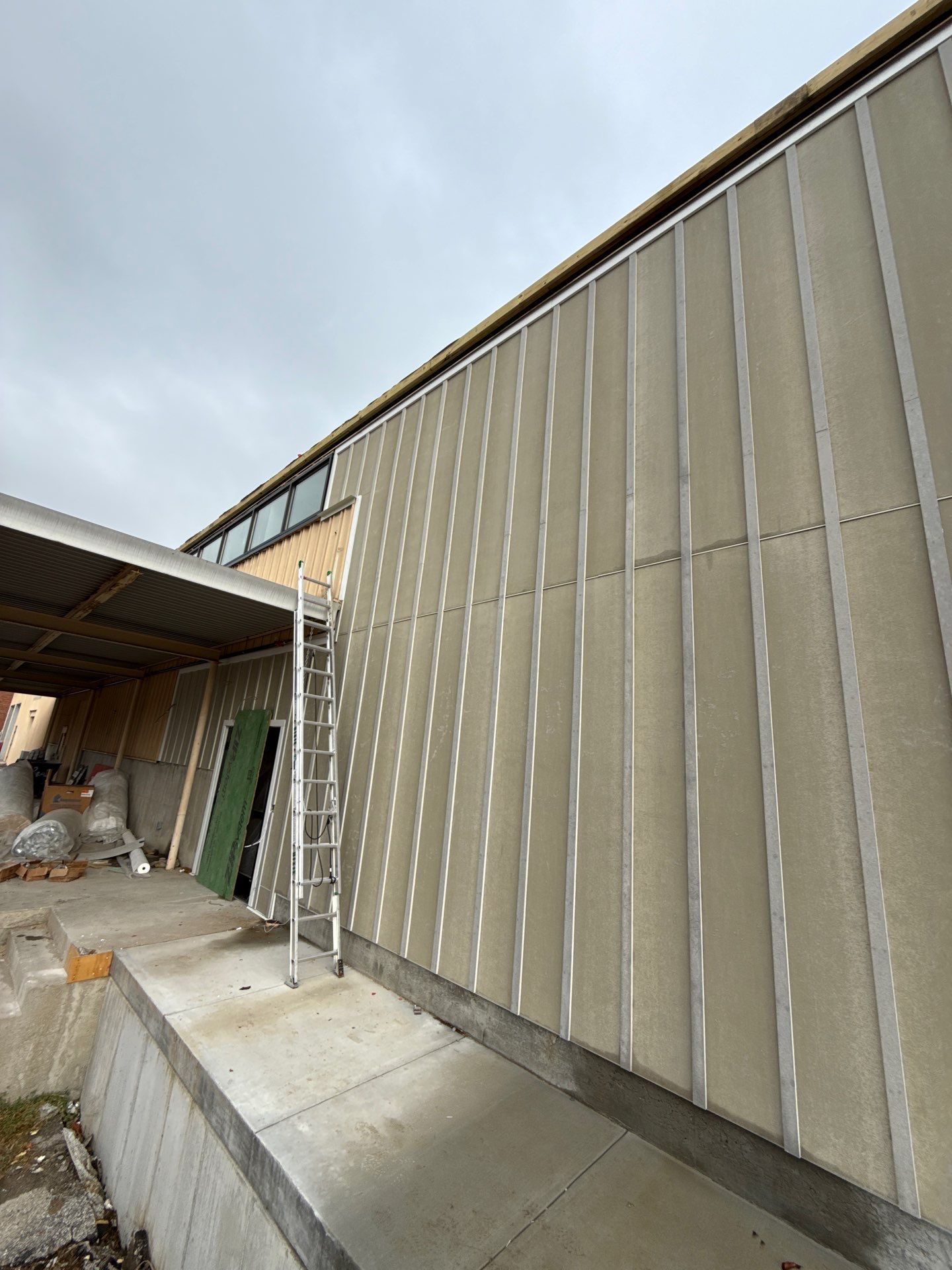 Louisville Commercial Building Siding and Window Installation by GreenForce Restoration