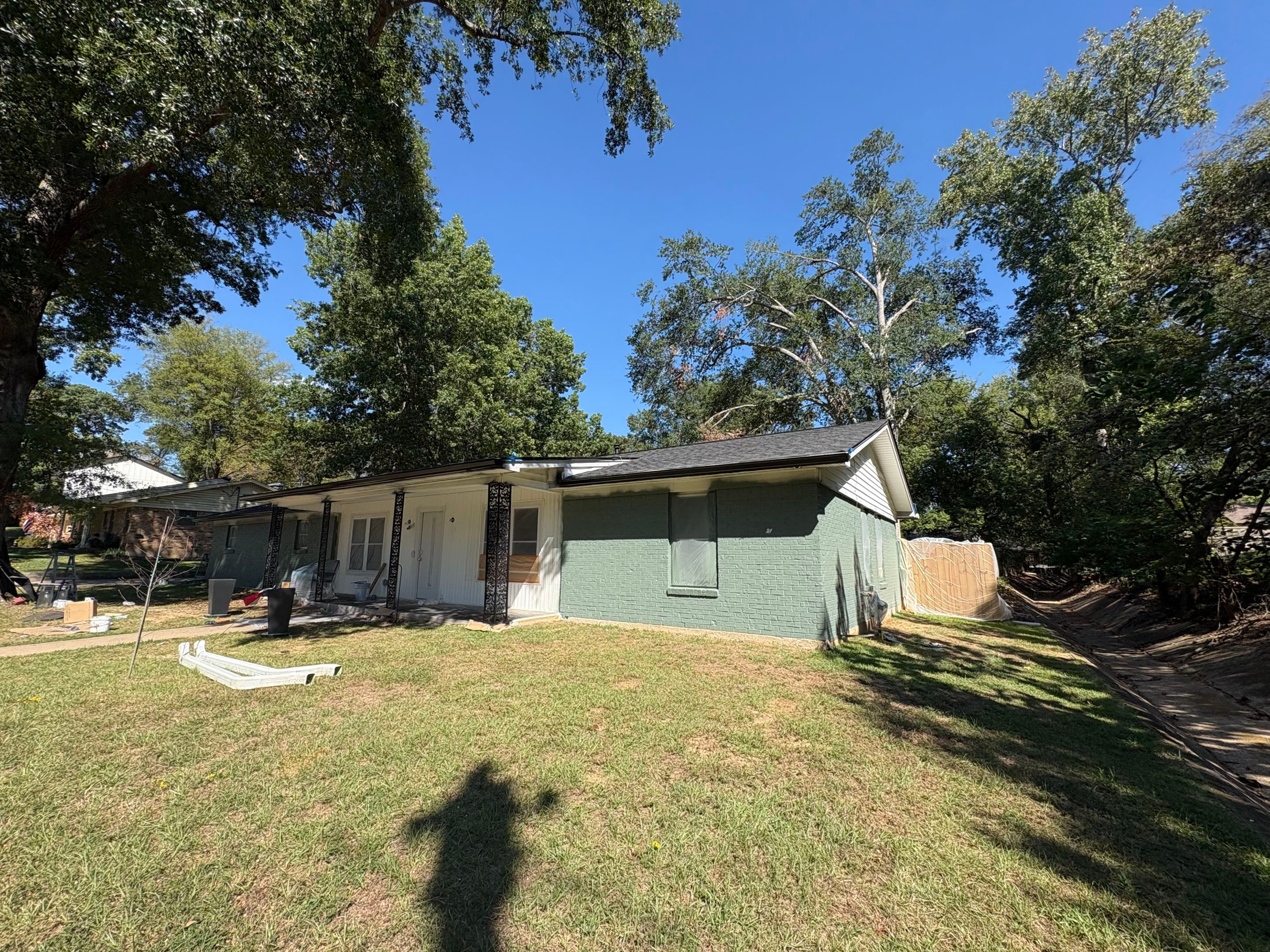 From Basic Brick to Bold Sage Green in Tyler, TX! Quality Coats Painting by Quality Coats Painting
