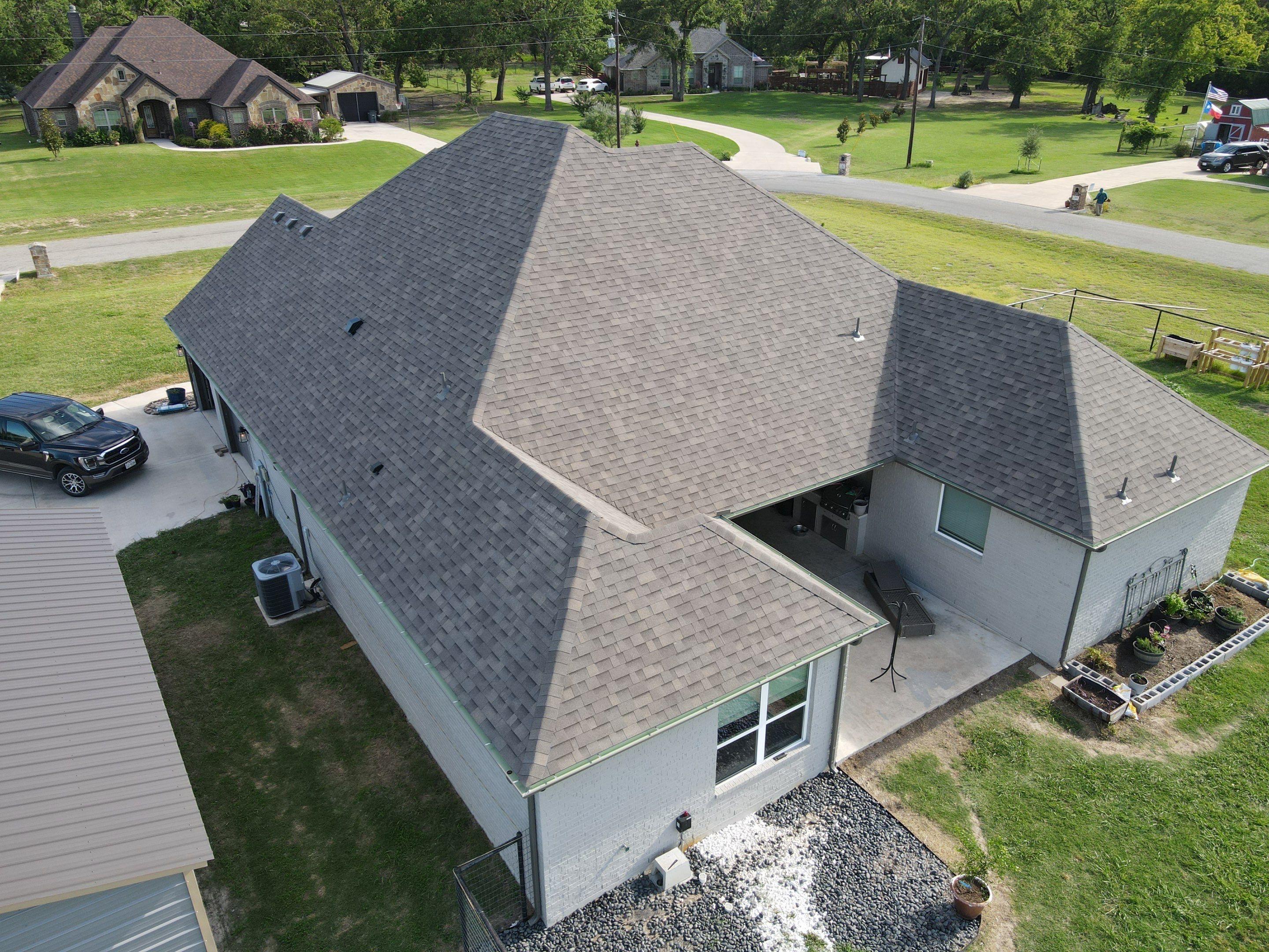 Architectural Shingle Roof Installation and Gutter Updates in Springtown by Berry Good Roofing