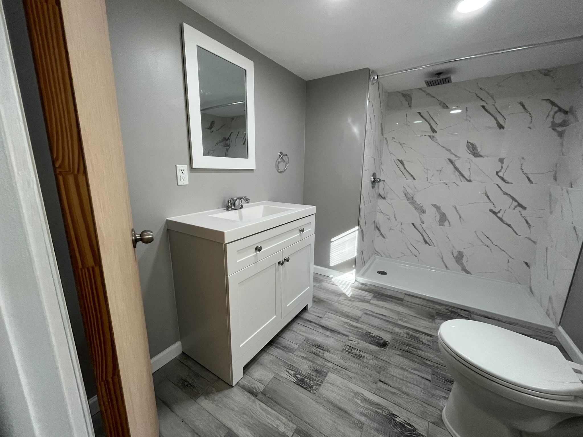Bathroom Remodel using Tile by Home Concepts Construction