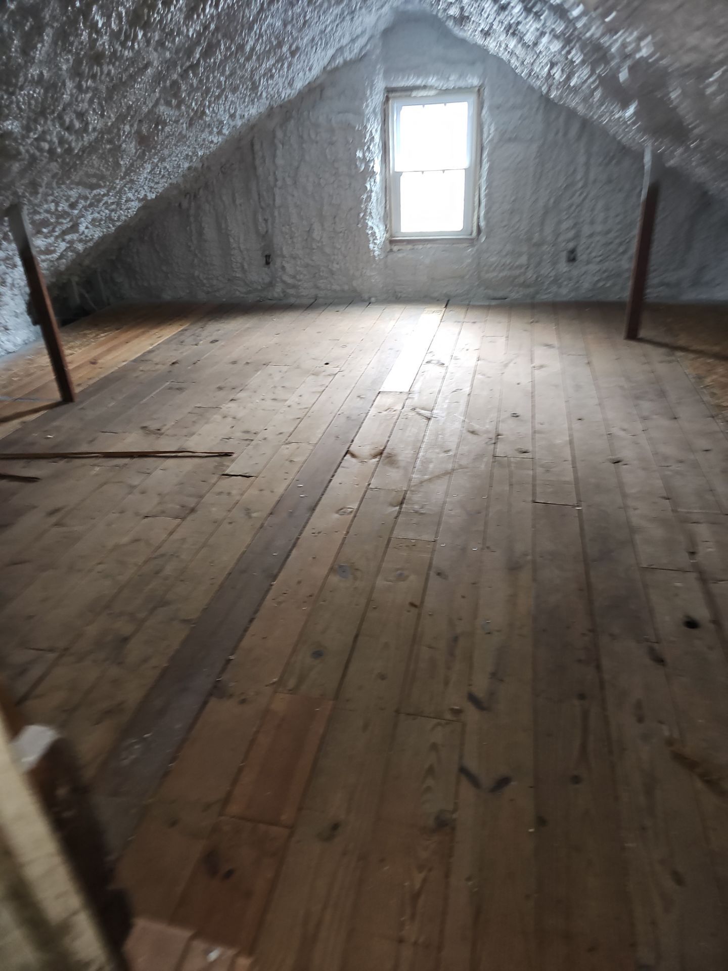 Attic Insulation using open cell spray foam by NYS Foam & Energy